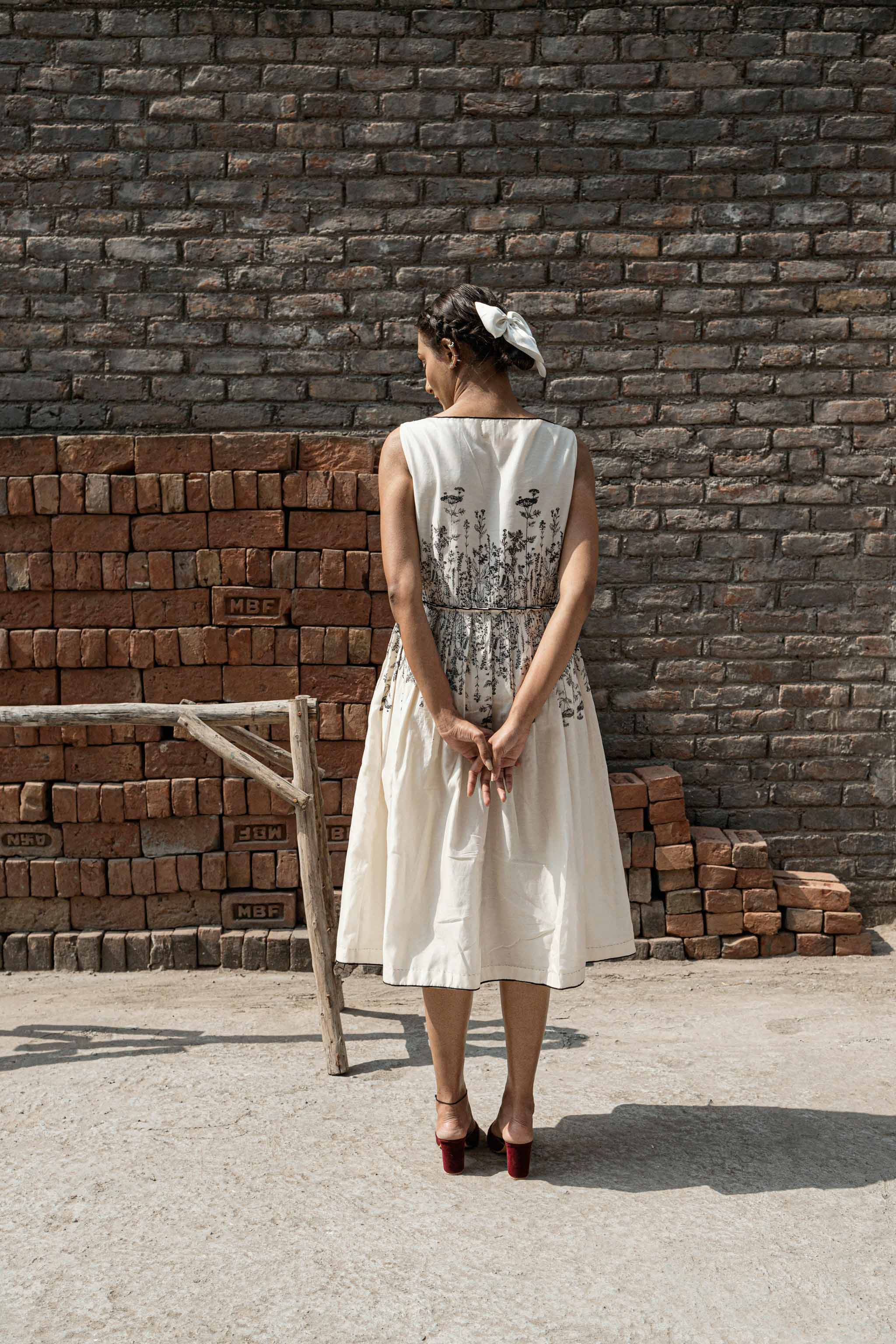 Ivory Knife Pleat Dress by Ahmev with Best Selling, Casual Wear, Chanderi, FB ADS JUNE, Ink And Ivory by Ahmev, Midi Dresses, Office Party, Prints, Regular Fit, Sleeveless Dresses, White, Womenswear at Kamakhyaa for sustainable fashion