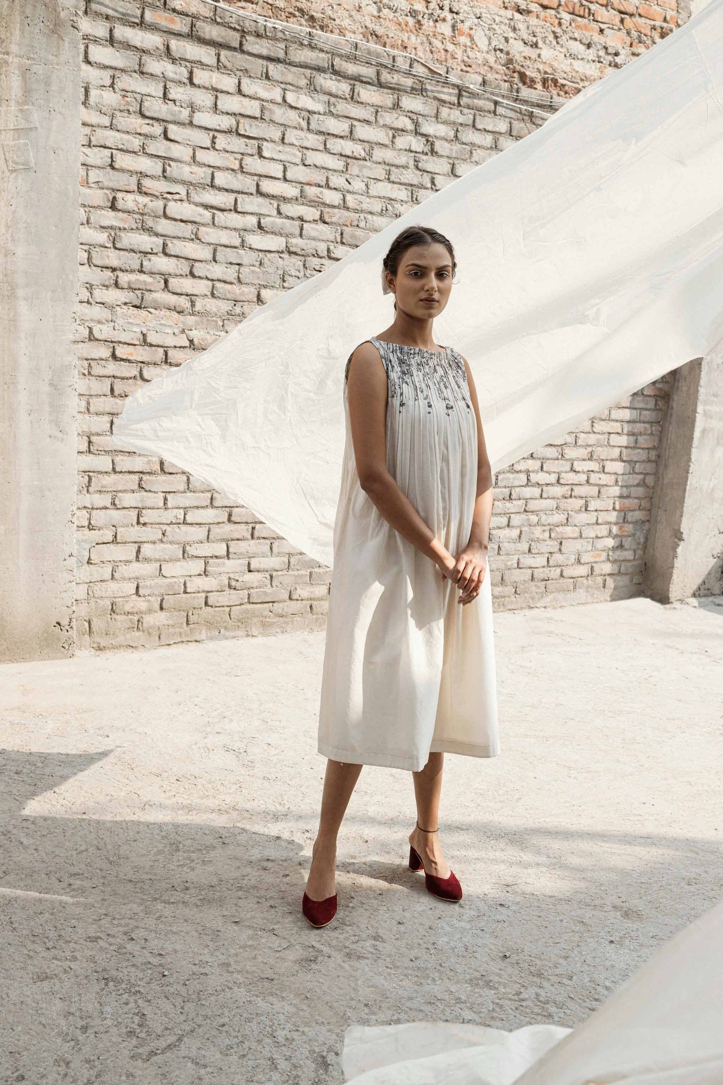 Ivory Pleated Neck Dress by Ahmev with Casual Wear, Chanderi, Ink And Ivory by Ahmev, Midi Dresses, Pinterest top pins, Prints, Regular Fit, Sleeveless Dresses, White, Womenswear at Kamakhyaa for sustainable fashion