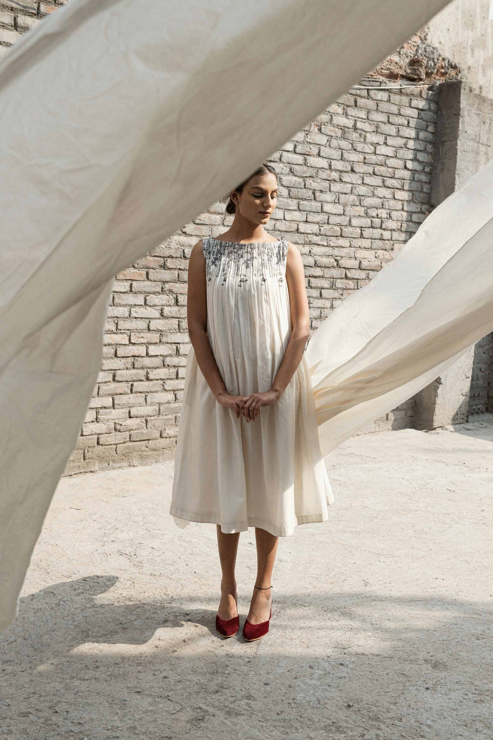 Ivory Pleated Neck Dress by Ahmev with Casual Wear, Chanderi, Ink And Ivory by Ahmev, Midi Dresses, Pinterest top pins, Prints, Regular Fit, Sleeveless Dresses, White, Womenswear at Kamakhyaa for sustainable fashion