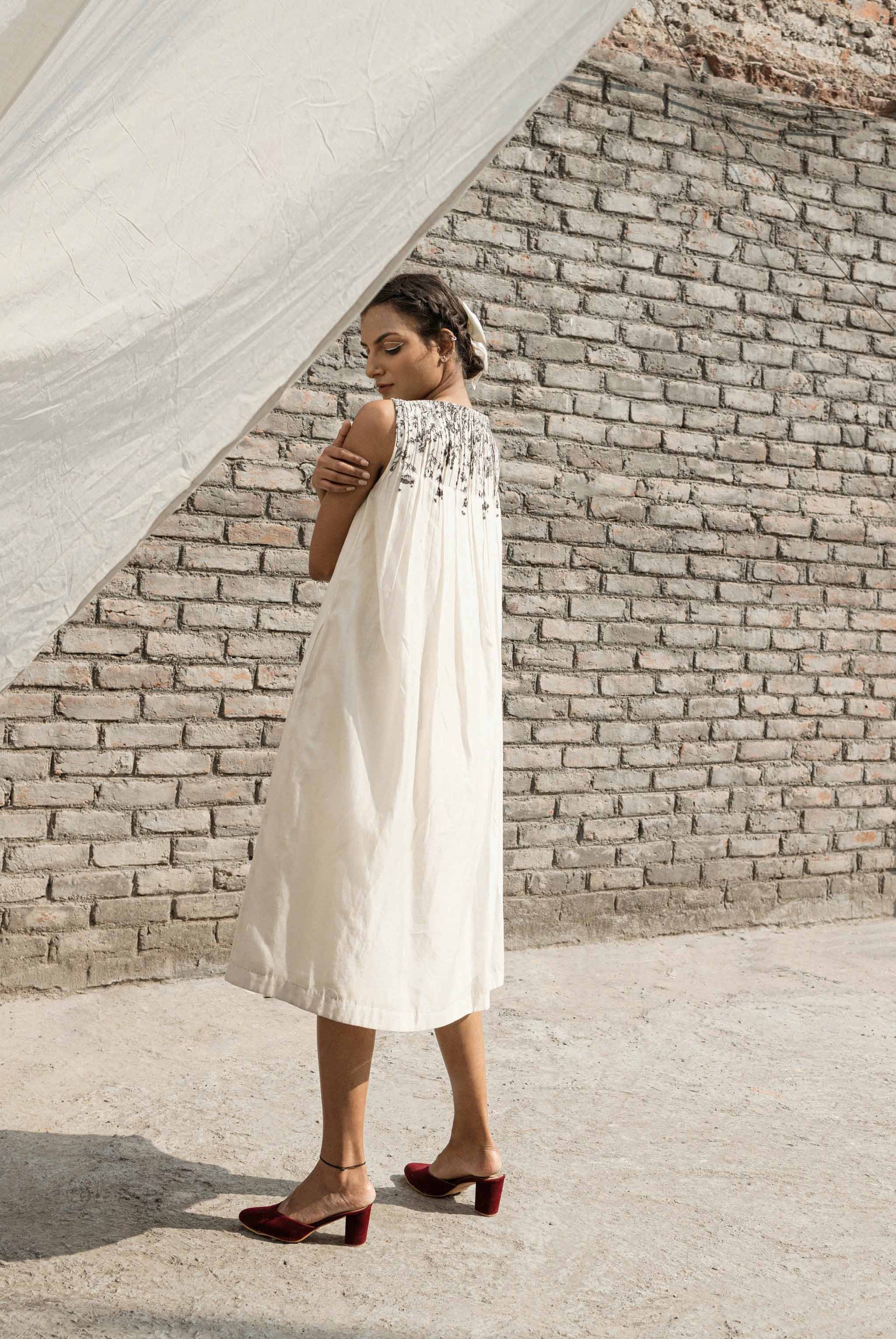 Ivory Pleated Neck Dress by Ahmev with Casual Wear, Chanderi, Ink And Ivory by Ahmev, Midi Dresses, Pinterest top pins, Prints, Regular Fit, Sleeveless Dresses, White, Womenswear at Kamakhyaa for sustainable fashion