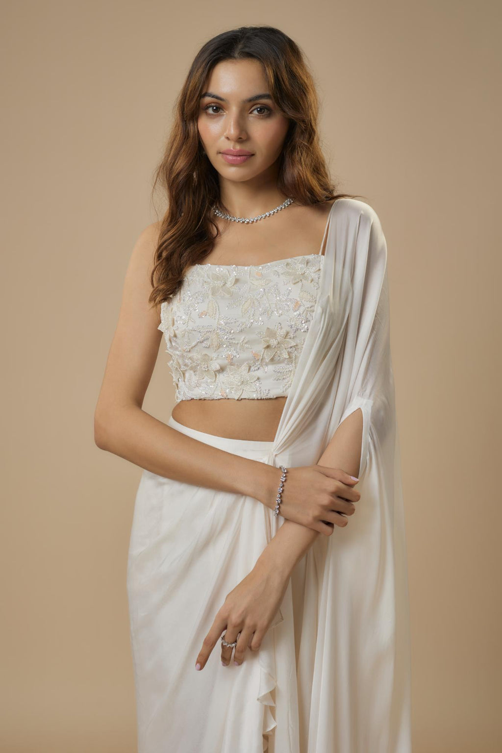 Georgette Ivory Drape Saree by Ewoke with destination wedding lehengas, embroidered lehengas, Georgette, Lehenga set, Nostalgia's Thread by Ewoke at Kamakhyaa for sustainable fashion