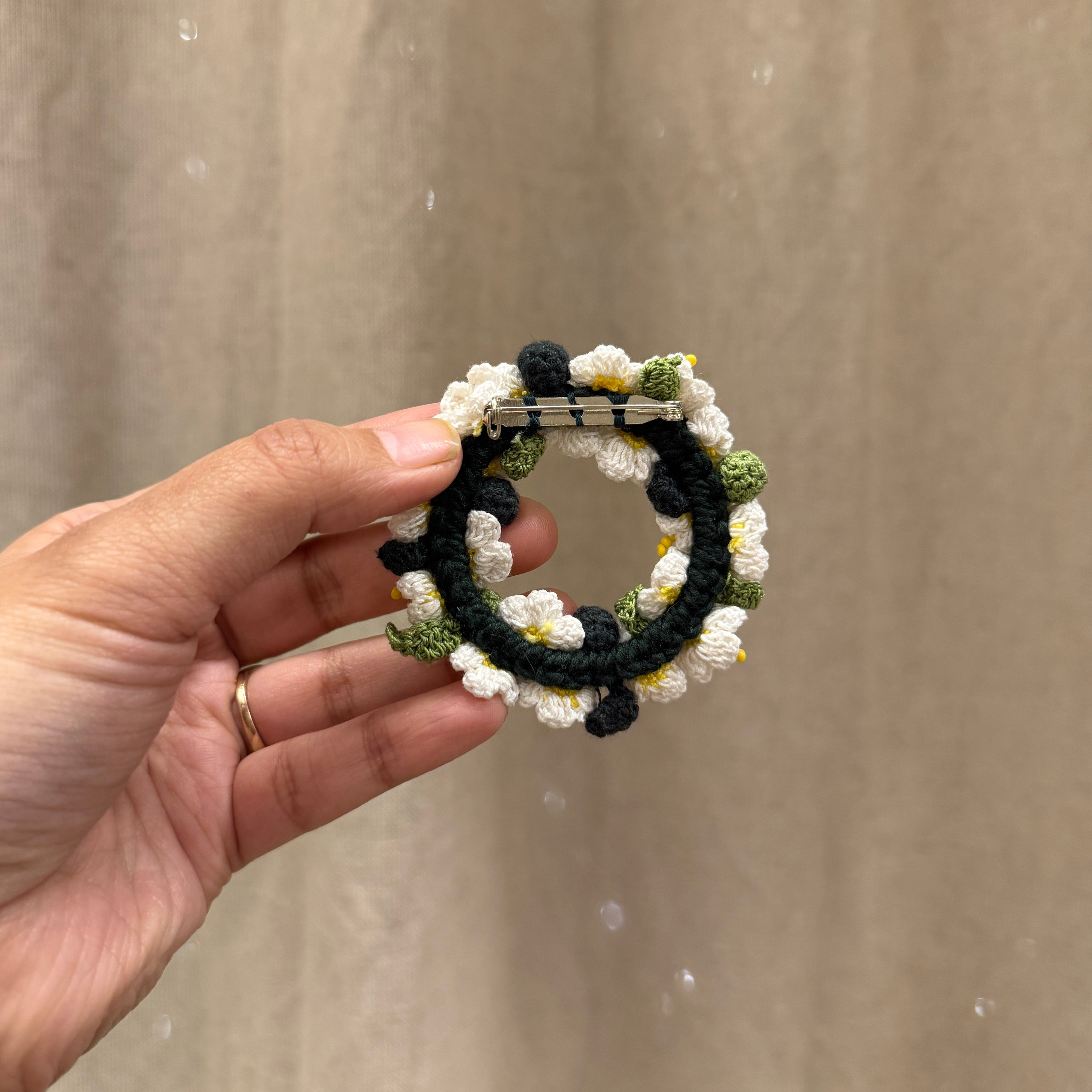 Safed Gul Brooch by Ikriit'm with brooch at Kamakhyaa for sustainable fashion