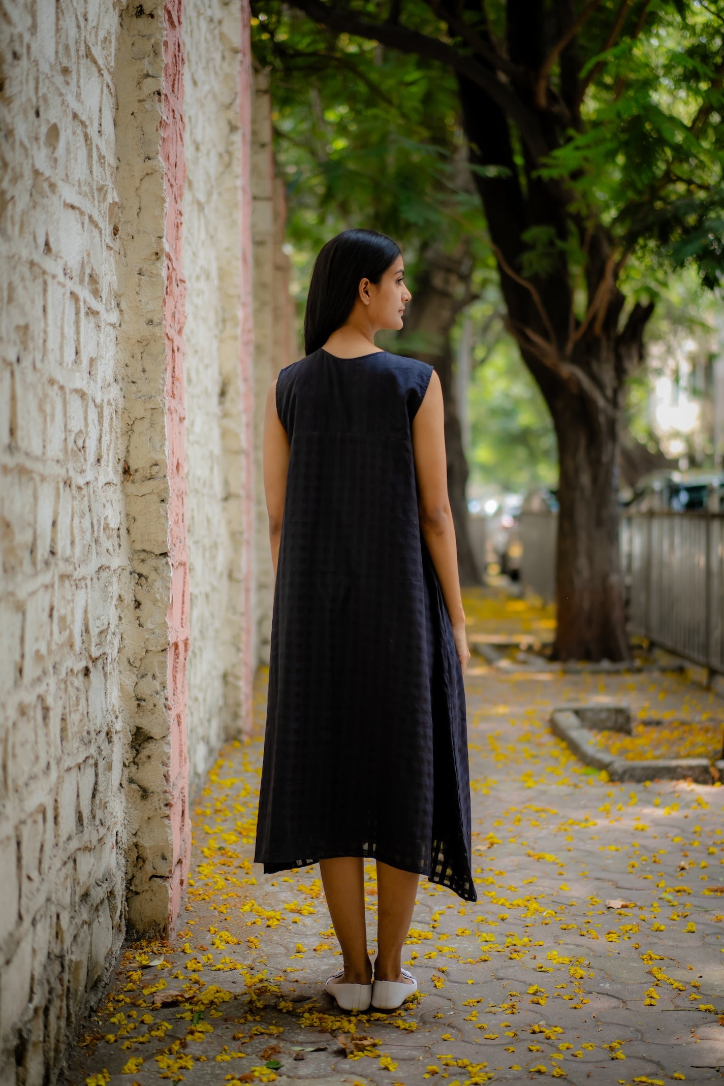 Black A-line Dress with Floral Hand-Embroidery by Krushnachuda with Black, Chilika by Krushnachuda, Embroidered, Handloom Cotton, Loose Fit, Natural Dye, Organic, Outerwear, Womenswear at Kamakhyaa for sustainable fashion