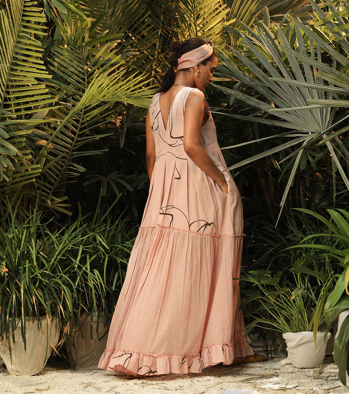 Pink Printed Midi Dress by Khara Kapas with Another Day In Paradise by Khara Kapas, Cotton, Lost In Paradise by Khara Kapas, Maxi Dresses, Natural, Pink, Printed Selfsame, Prints, Regular Fit, Resort Wear, Sleeveless Dresses, Tiered Dresses, Womenswear at Kamakhyaa for sustainable fashion