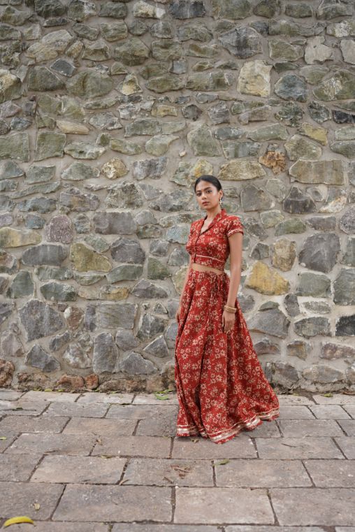 Red Hand Block Printed Lehenga Set by Hasttvam with Cotton, Festive Wear, Floral, Handmade by Artisans, Natural dyes, Navratri, Navratri Teens, Rang by Hasttvam, Red, Relaxed Fit, Respondible production and Vegan at Kamakhyaa for sustainable fashion