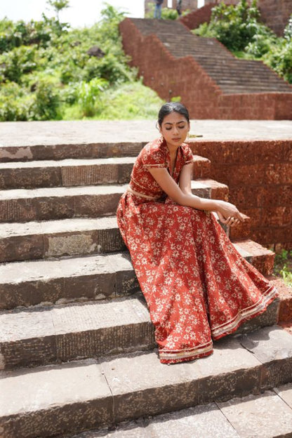 Red Hand Block Printed Lehenga Set by Hasttvam with Cotton, Festive Wear, Floral, Handmade by Artisans, Natural dyes, Navratri, Navratri Teens, Rang by Hasttvam, Red, Relaxed Fit, Respondible production and Vegan at Kamakhyaa for sustainable fashion