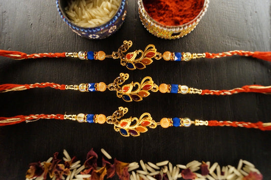 Set of 3-Peacock Colorful Stone Thread Rakhi by Kamakhyaa with Festive Wear, Jewellery, Multicolor, Natural Materials, Natural Threads, Peacock, Rakhi, Rakhis Ready to Ship, Regular Fit, Upcycled, Zari Threads at Kamakhyaa for sustainable fashion