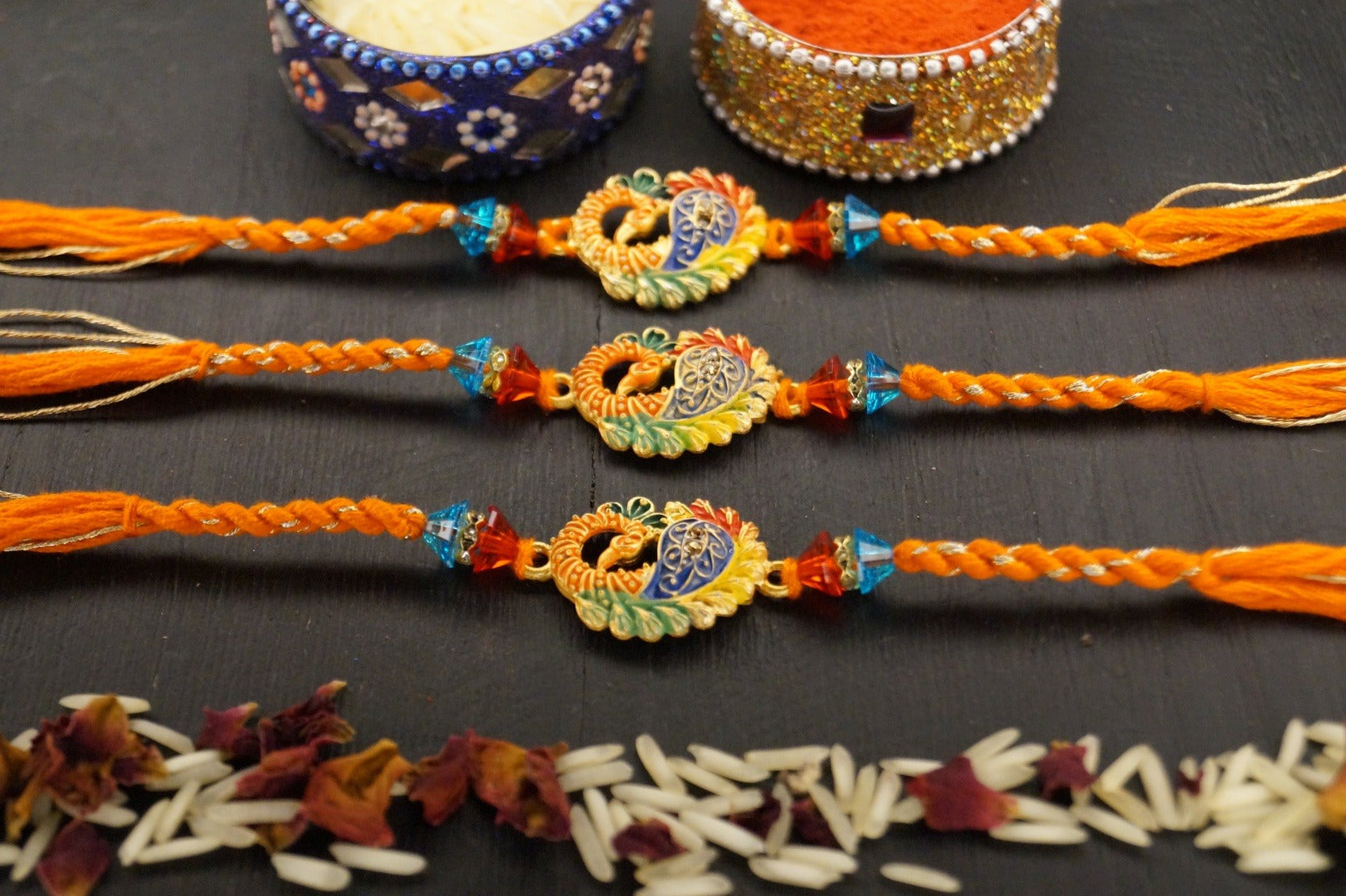 Set of 3-Peacock Gold Brass Thread Rakhi by Kamakhyaa with Brass, Festive Wear, Jewellery, Multicolor, Natural Materials, Natural Threads, Rakhi, Rakhis Ready to Ship, Regular Fit, Upcycled, Zari Threads at Kamakhyaa for sustainable fashion