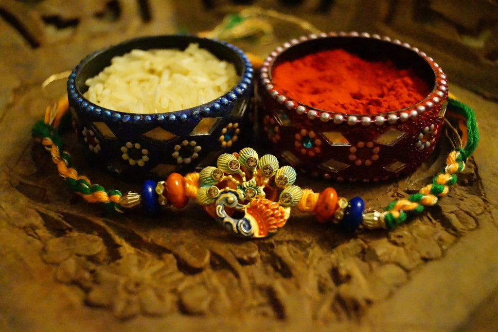 Set of 3-Peacock Stone Thread Rakshi by Kamakhyaa with Festive Wear, Jewellery, Multicolor, Natural Materials, Natural Threads, Peacock, Rakhi, Rakhis Ready to Ship, Regular Fit, Upcycled, Zari Threads at Kamakhyaa for sustainable fashion