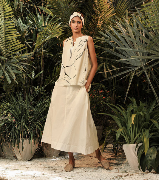 White Two Piece Set at Kamakhyaa by Khara Kapas. This item is Co-ord Sets, Lost In paradise, Mul Cotton, Poplin, Relaxed Fit, Resort Wear, Skirt Sets, Solids, Vacation, Vacation Co-ords, White, Womenswear