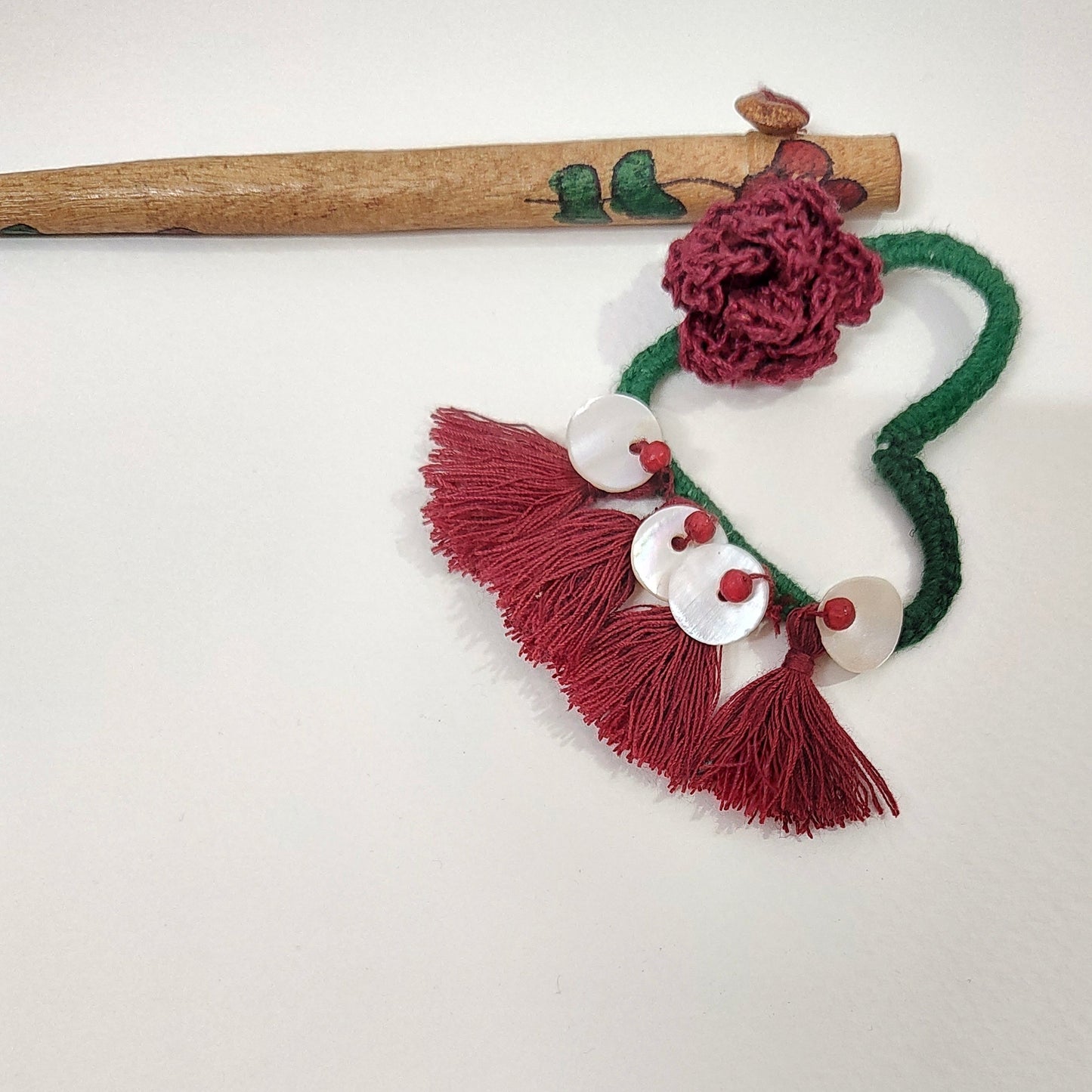 Wooden Hair Stick Rosy Red And Green by Ikriit'm with Cotton Yarn, Free Size, Green, Hair Stick, Ikriit'm, Made from Natural Materials, Red, Women Led Designer at Kamakhyaa for sustainable fashion