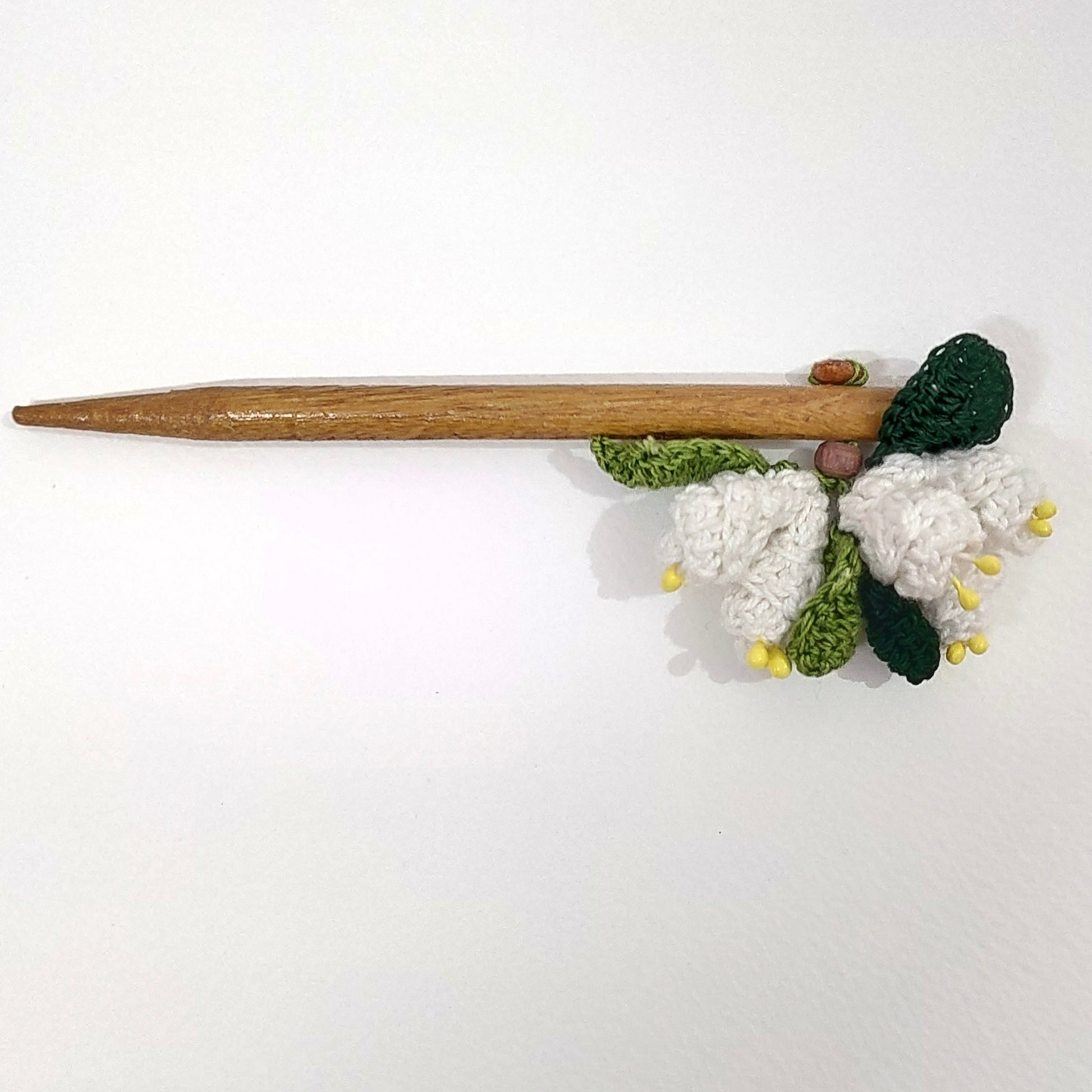 Wooden Hair Stick White And Green by Ikriit'm with Cotton Yarn, Free Size, Green, Hair Stick, Ikriit'm, Made from Natural Materials, White, Women Led Designer at Kamakhyaa for sustainable fashion