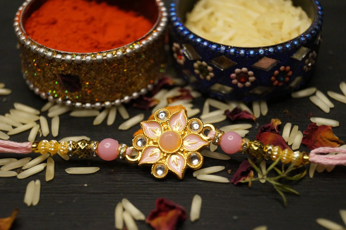 Floral Gold Brass Rakhi by Kamakhyaa with Brass, Festive Wear, Green, Grey, Jewellery, Natural Materials, Natural Threads, Pink, Rakhi, Rakhis Ready to Ship, Red, Regular Fit, Upcycled, Yellow, Zari Threads at Kamakhyaa for sustainable fashion