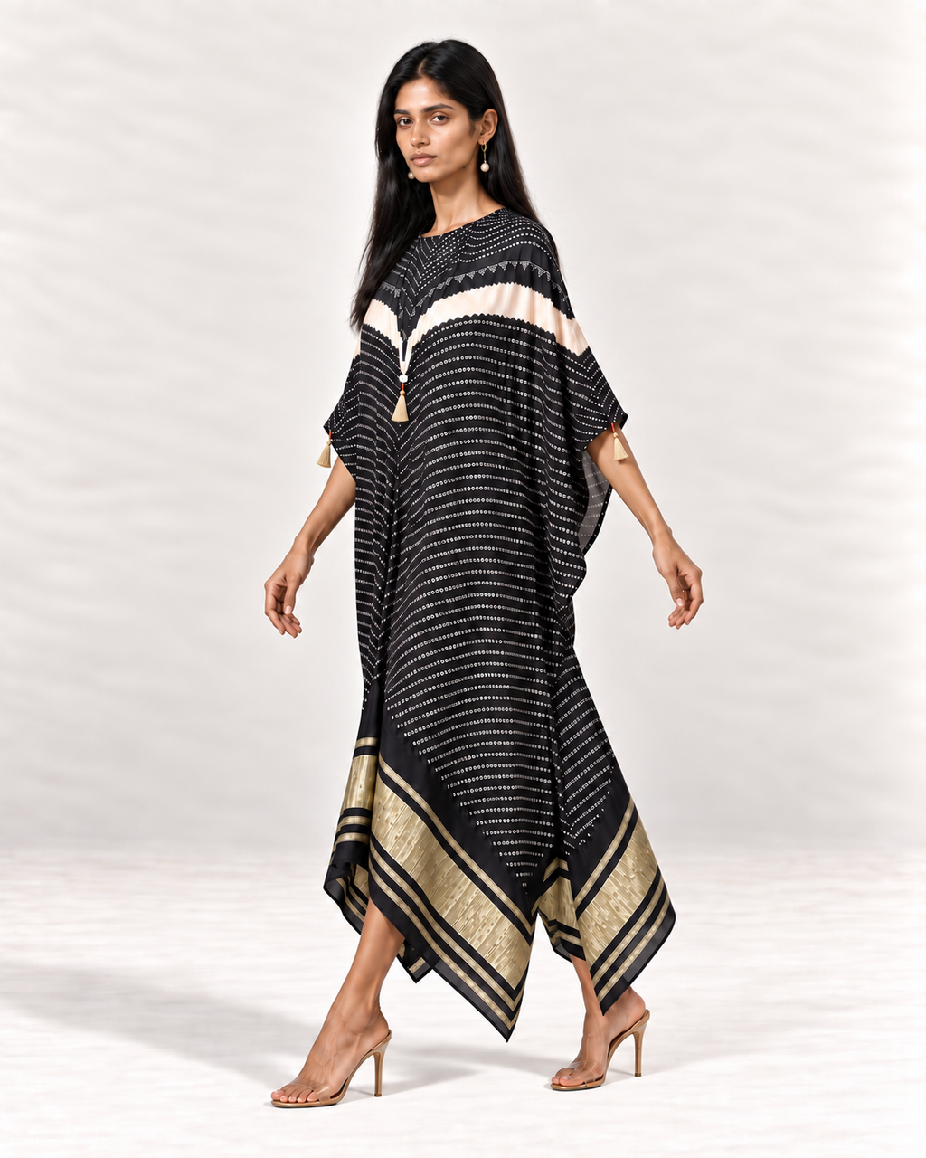 Charcoal, ivory and black Bandhej kaftan on model, left walking view
