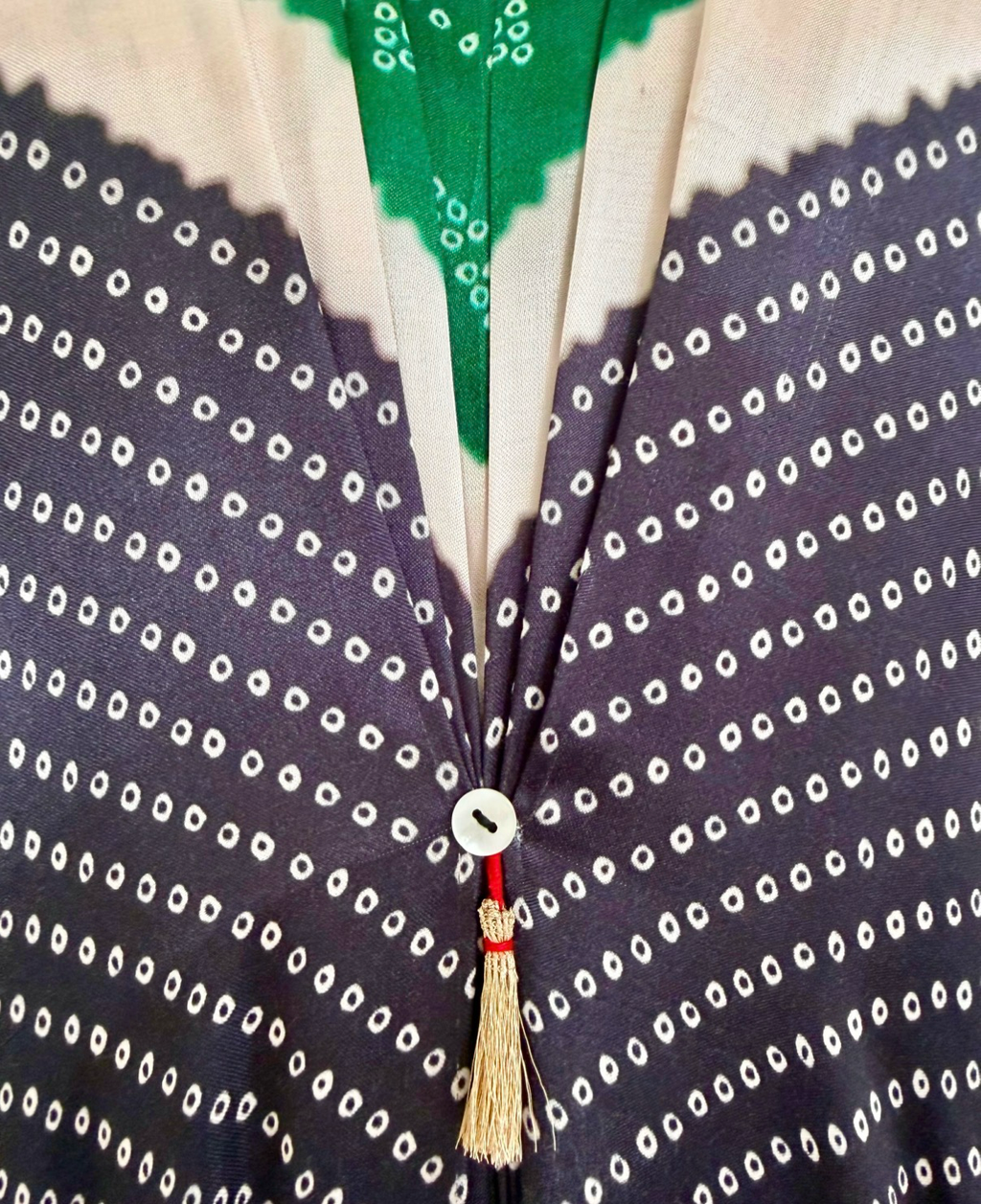 Green, ivory and black Bandhej kaftan fabric detail