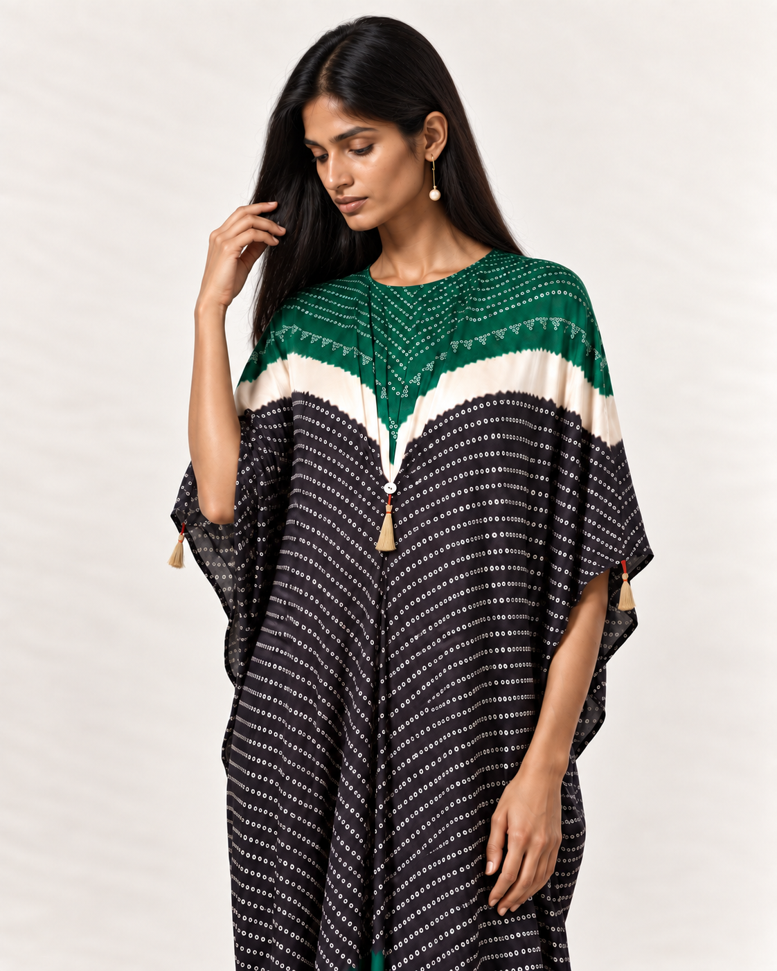 Green, ivory and black Bandhej kaftan on model, three-quarter detail view