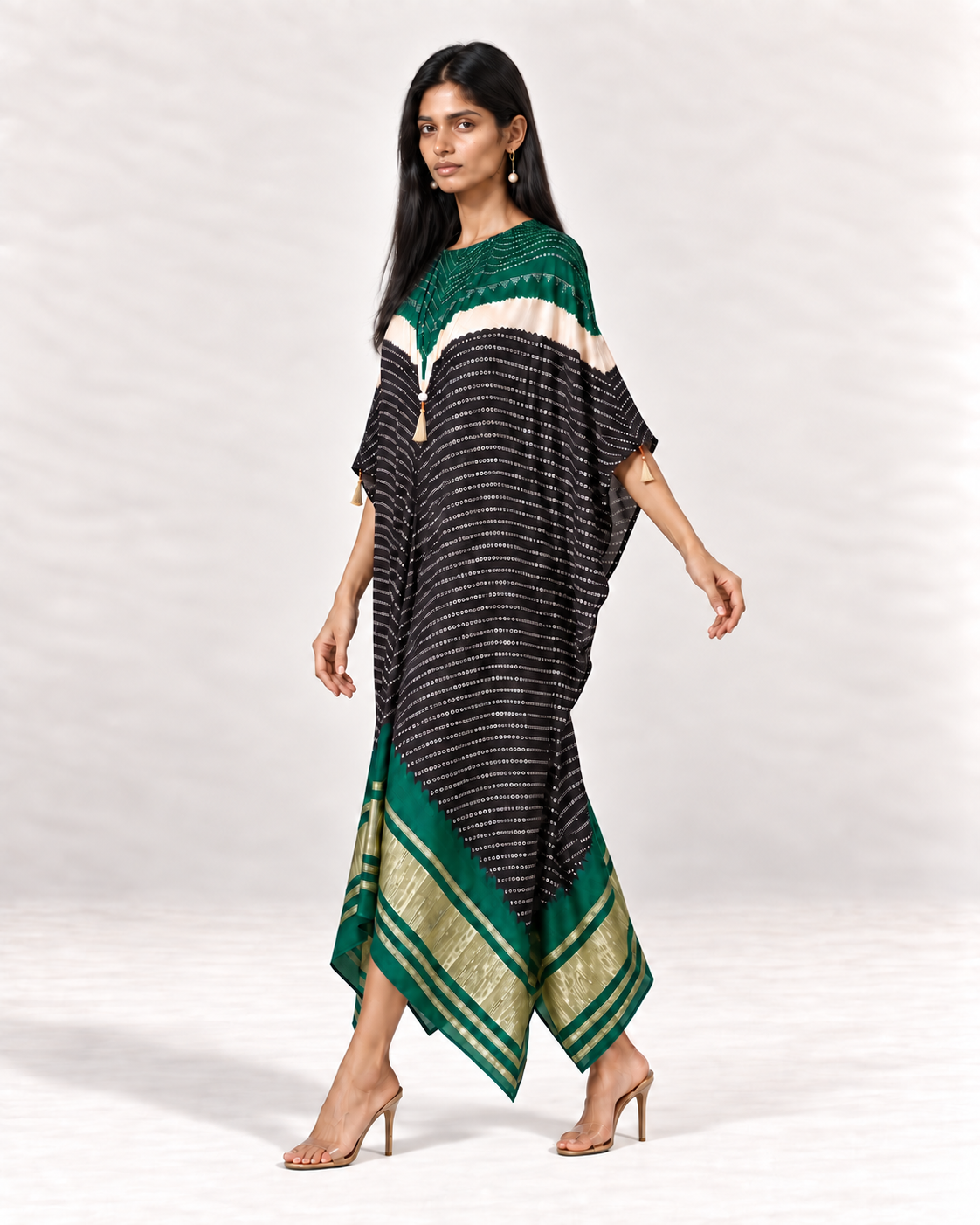 Green, ivory and black Bandhej kaftan on model, left walking view
