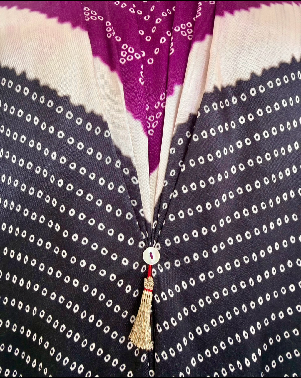 Purple, ivory and black Bandhej kaftan fabric detail