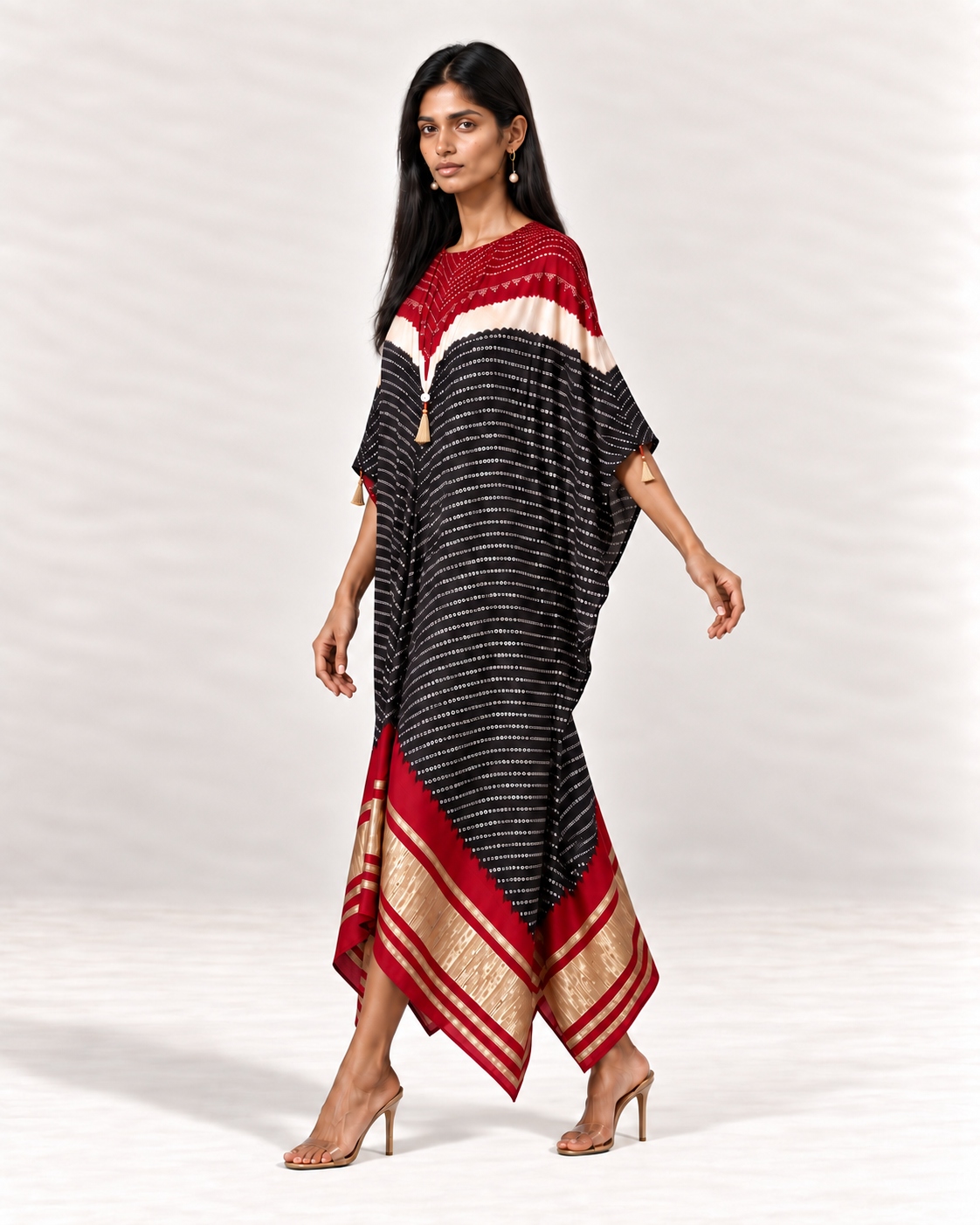 Red, ivory and black Bandhej kaftan on model, left walking view