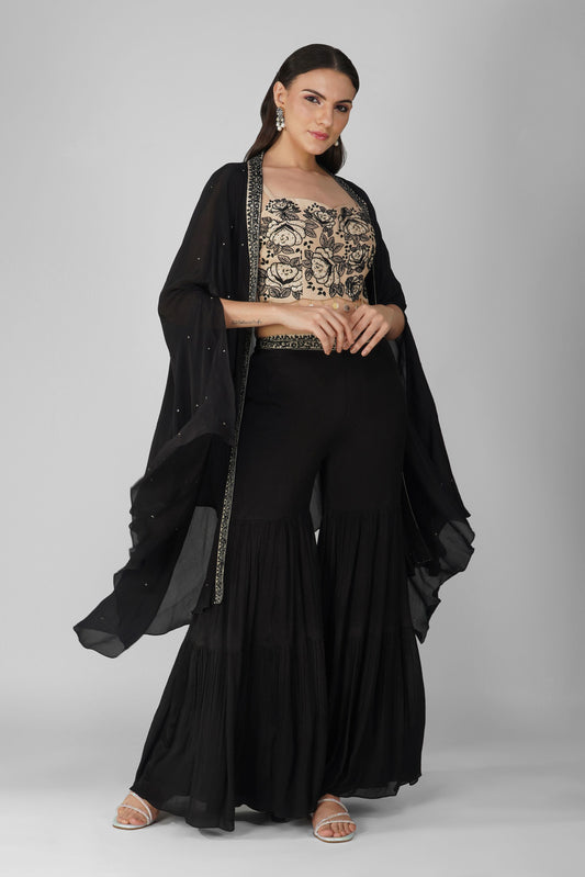 Black Chiffon Cape And Garara Set by Devyani Mehrotra with Black, Chiffon, Embellished, Indian Wear, Natural, Party Wear, Regular Fit, Womenswear at Kamakhyaa for sustainable fashion