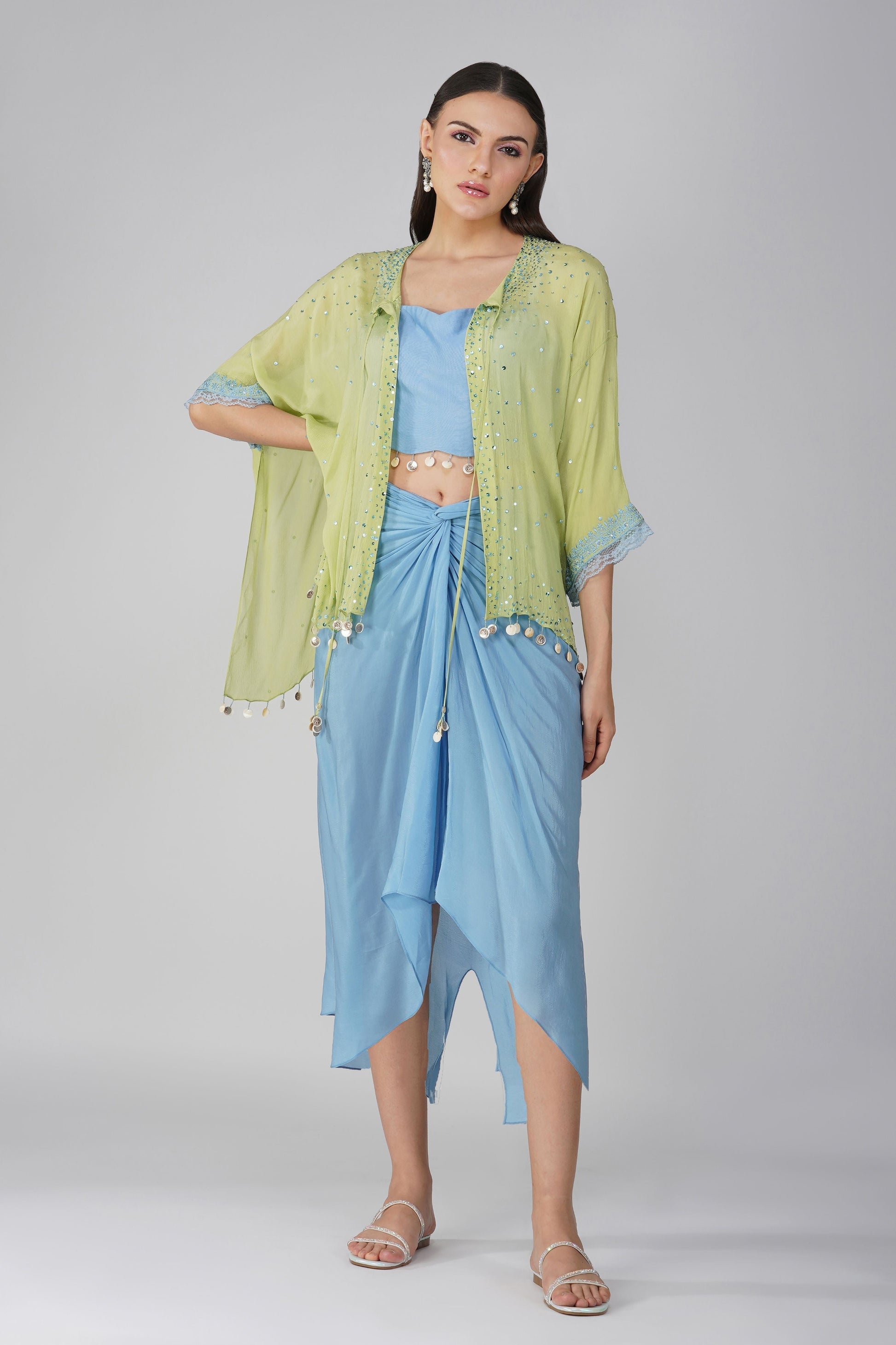Blue Chiffon Drape skirt and Cape Set by Devyani Mehrotra with Blue, Chiffon, Embellished, Green, Indian Wear, Natural, Party Wear, Regular Fit, Womenswear at Kamakhyaa for sustainable fashion