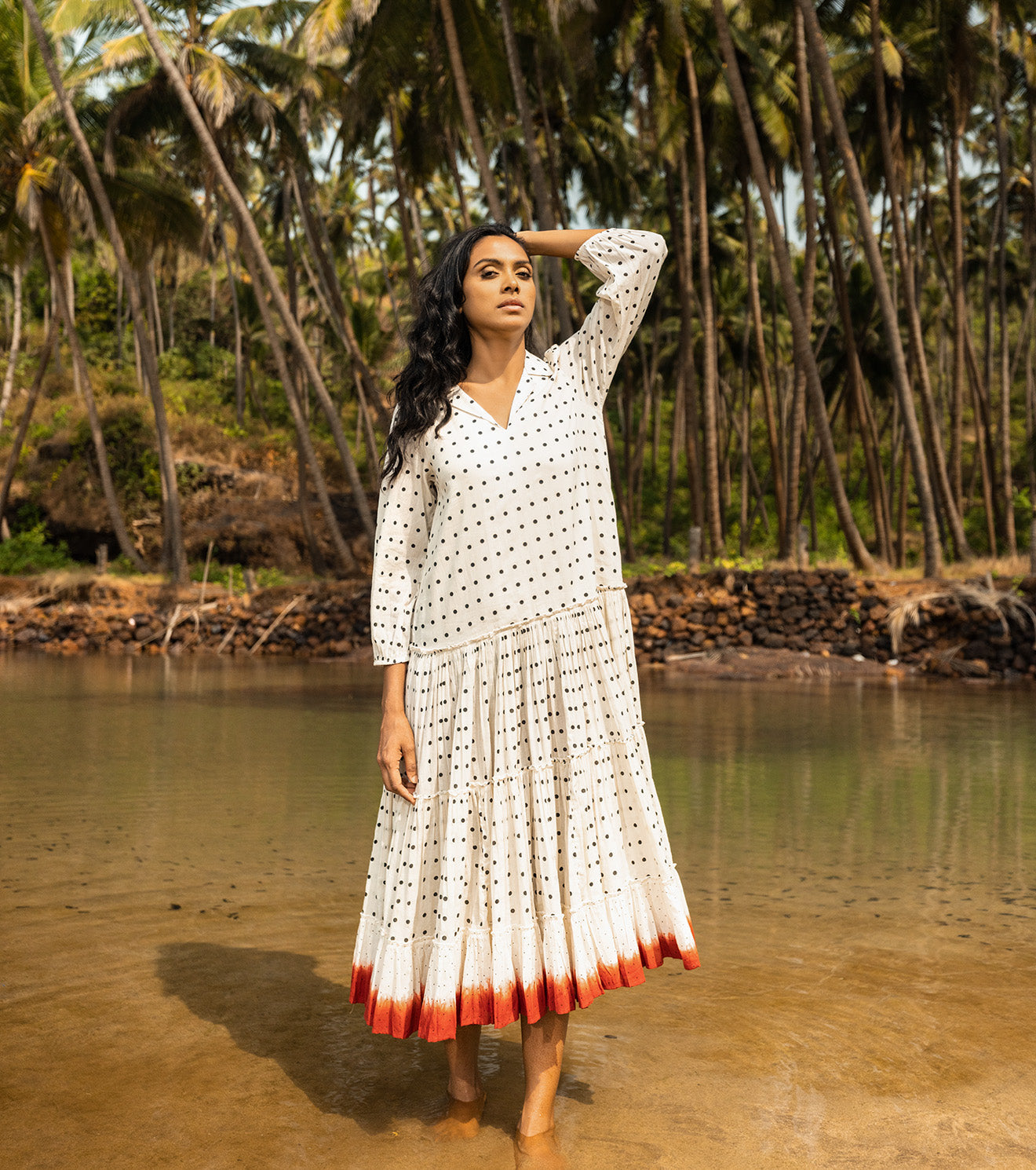 White Red Midi Dress at Kamakhyaa by Khara Kapas. This item is Best Selling, Cotton, Midi Dresses, Mulmul, Natural, Oh Carol, Resort Wear, Solids, Tiered Dresses, White, Womenswear