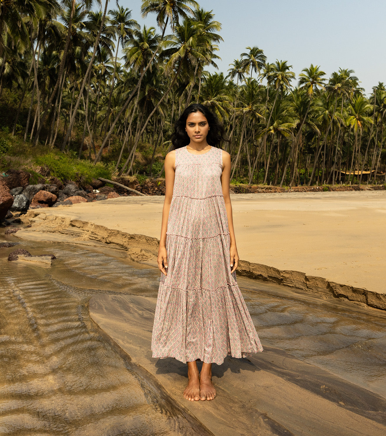 Pink Maxi Dress by Khara Kapas with Cotton, Maxi Dresses, Natural, Oh Carol, Oh Carol by Khara Kapas, Pink, Regular Fit, Resort Wear, Sleeveless Dresses, Solids, Tiered Dresses, Womenswear at Kamakhyaa for sustainable fashion