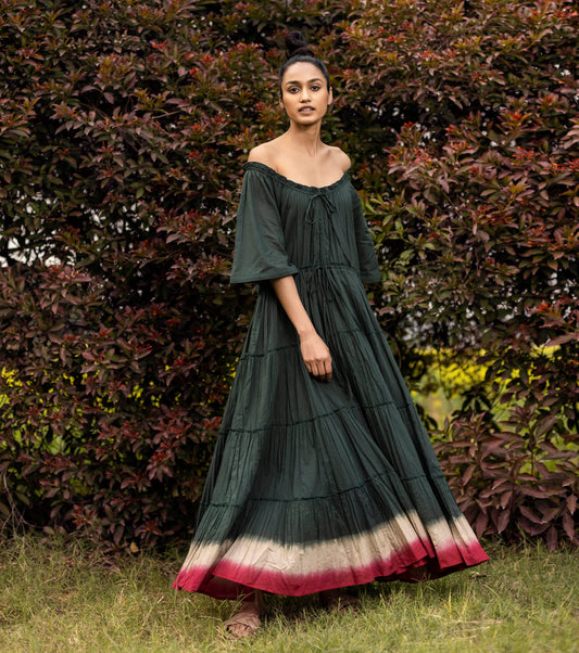 Green Maxi Dress with Pockets by Khara Kapas with Best Selling, Green, Lost & Found by Khara Kapas, Maxi Dresses, Mulmul, Natural, Off-Shoulder Dresses, Ombre & Dyes, Regular Fit, Resort Wear, Solid Selfmade, Tiered Dresses, Womenswear at Kamakhyaa for sustainable fashion