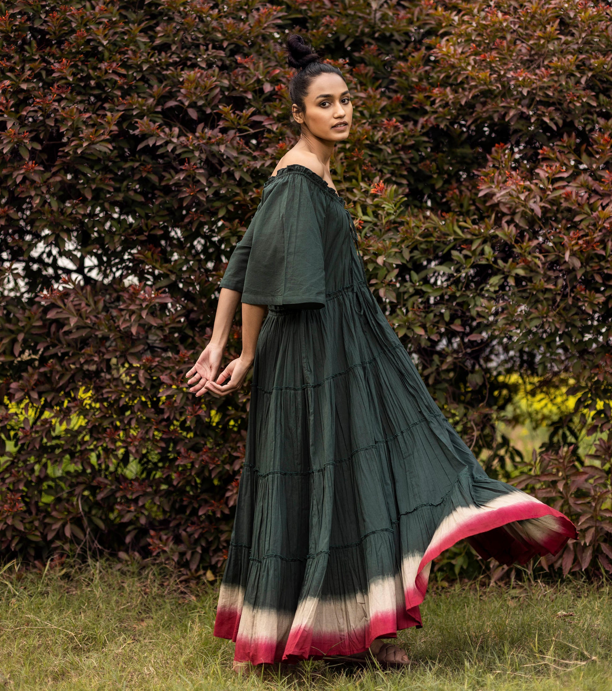 Green Maxi Dress with Pockets by Khara Kapas with Best Selling, Green, Lost & Found by Khara Kapas, Maxi Dresses, Mulmul, Natural, Off-Shoulder Dresses, Ombre & Dyes, Regular Fit, Resort Wear, Solid Selfmade, Tiered Dresses, Womenswear at Kamakhyaa for sustainable fashion