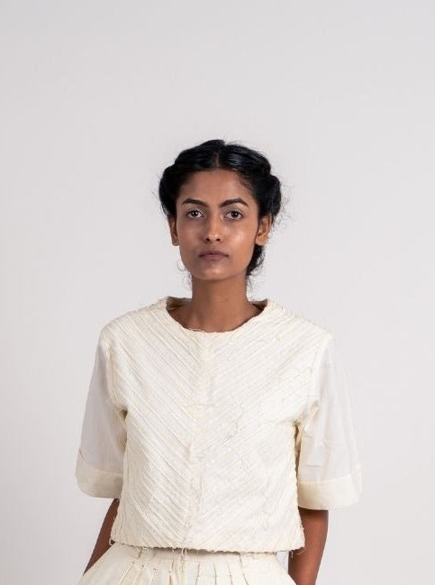 White Textured Crop Top by Ahmev with Broken Book by Ahmev, Casual Wear, Crop Tops, Handloom Cotton, Highend fashion, July Sale, July Sale 2023, Natural, Regular Fit, Textured, Tops, White, Womenswear at Kamakhyaa for sustainable fashion