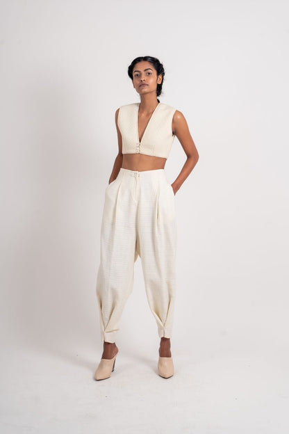 White Ankle Loop Pant by Ahmev with Broken Book by Ahmev, Casual Wear, Fitted At Waist, Handloom Cotton, July Sale, July Sale 2023, Natural, Pants, Textured, White, Womenswear at Kamakhyaa for sustainable fashion