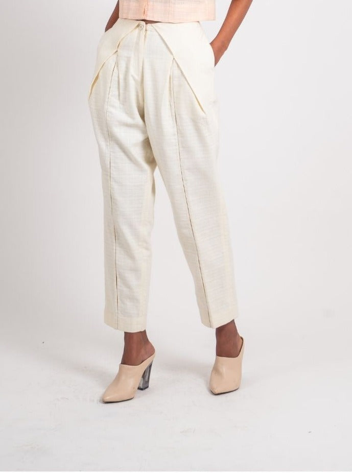 White Textured Pleated Pant by Ahmev with Broken Book by Ahmev, Casual Wear, Fitted At Waist, Handloom Cotton, Highend fashion, July Sale, July Sale 2023, Natural, Solids, Trousers, White, Womenswear at Kamakhyaa for sustainable fashion