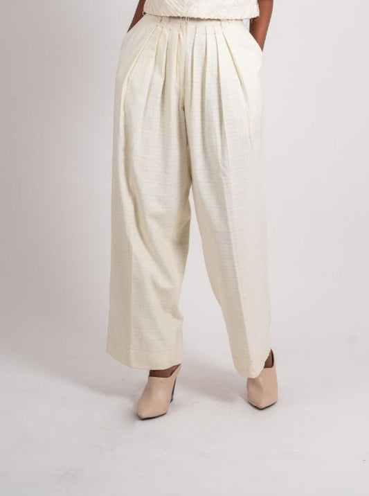 White Pleated Pants by Ahmev with Bottoms, Broken Book by Ahmev, Casual Wear, Fitted At Waist, Handloom Cotton, July Sale, July Sale 2023, Natural, Palazzo Pants, Textured, White, Womenswear at Kamakhyaa for sustainable fashion