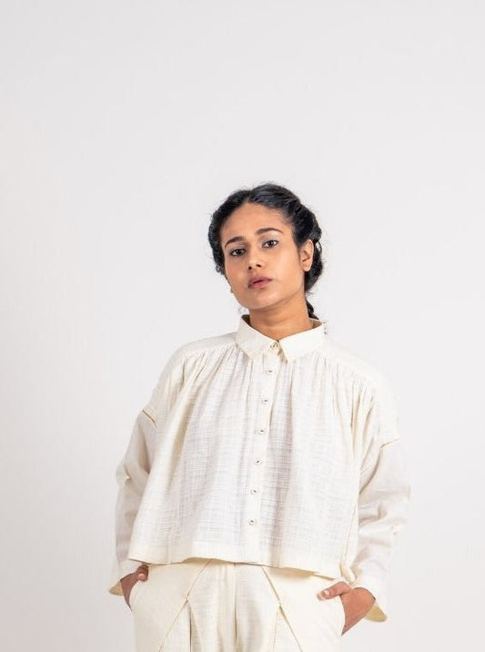 White Cotton Gathered Shirt by Ahmev with Broken Book by Ahmev, Casual Wear, Handloom Cotton, July Sale, July Sale 2023, Natural, Relaxed Fit, Shirts, Solids, Tops, White, Womenswear at Kamakhyaa for sustainable fashion