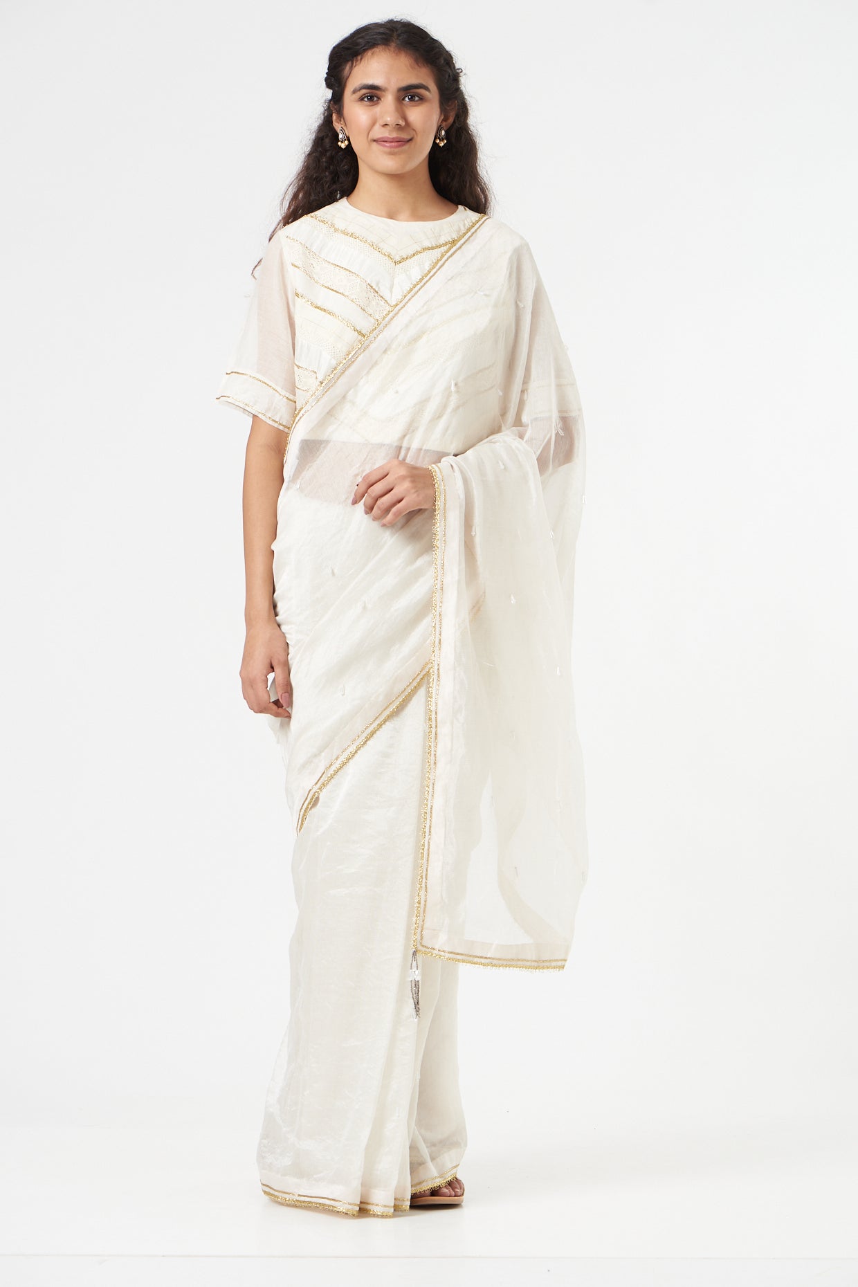 White Textured Saree + Peticot by Ahmev with Casual Wear, Festive '22, Festive'22 by Ahmev, Free Size, Indian Wear, July Sale, July Sale 2023, Natural, New, Regular Fit, Saree Sets, Silk Chanderi, Textured, White, Womenswear at Kamakhyaa for sustainable fashion