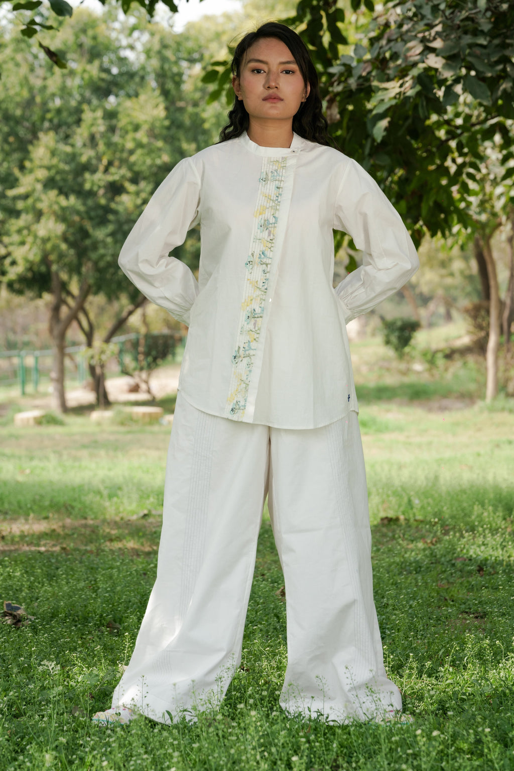 White Pleated placket shirt by Ahmev with Batik, Casual Wear, Cottage Garden, Cottage Garden by Ahmev, Cotton, Handpainted, July Sale, July Sale 2023, Natural, Prints, Regular Fit, Shirts, Tops, White, Womenswear at Kamakhyaa for sustainable fashion