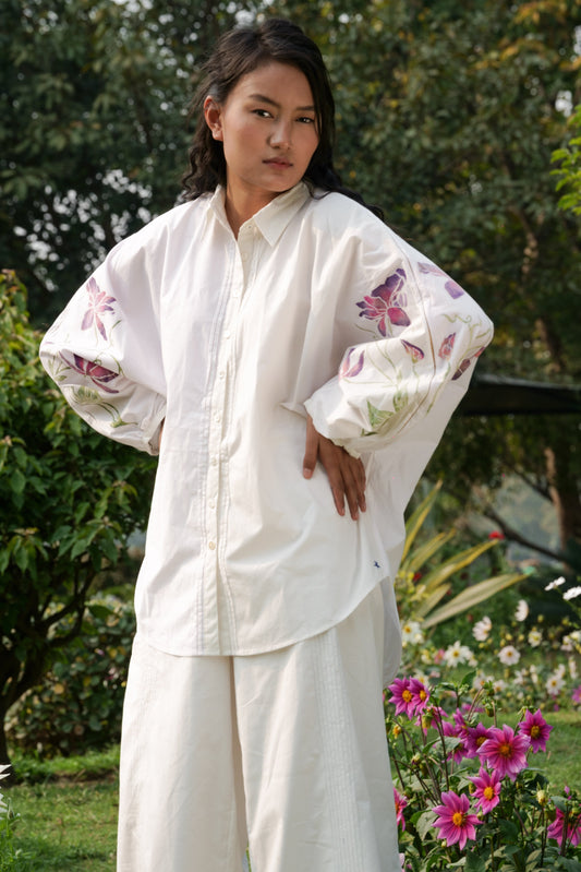 White Cotton Sleeve shirt by Ahmev with Batik, Casual Wear, Cottage Garden, Cottage Garden by Ahmev, Cotton, Hanpainted, July Sale, July Sale 2023, Natural, Prints, Regular Fit, Shirts, Tops, White, Womenswear at Kamakhyaa for sustainable fashion