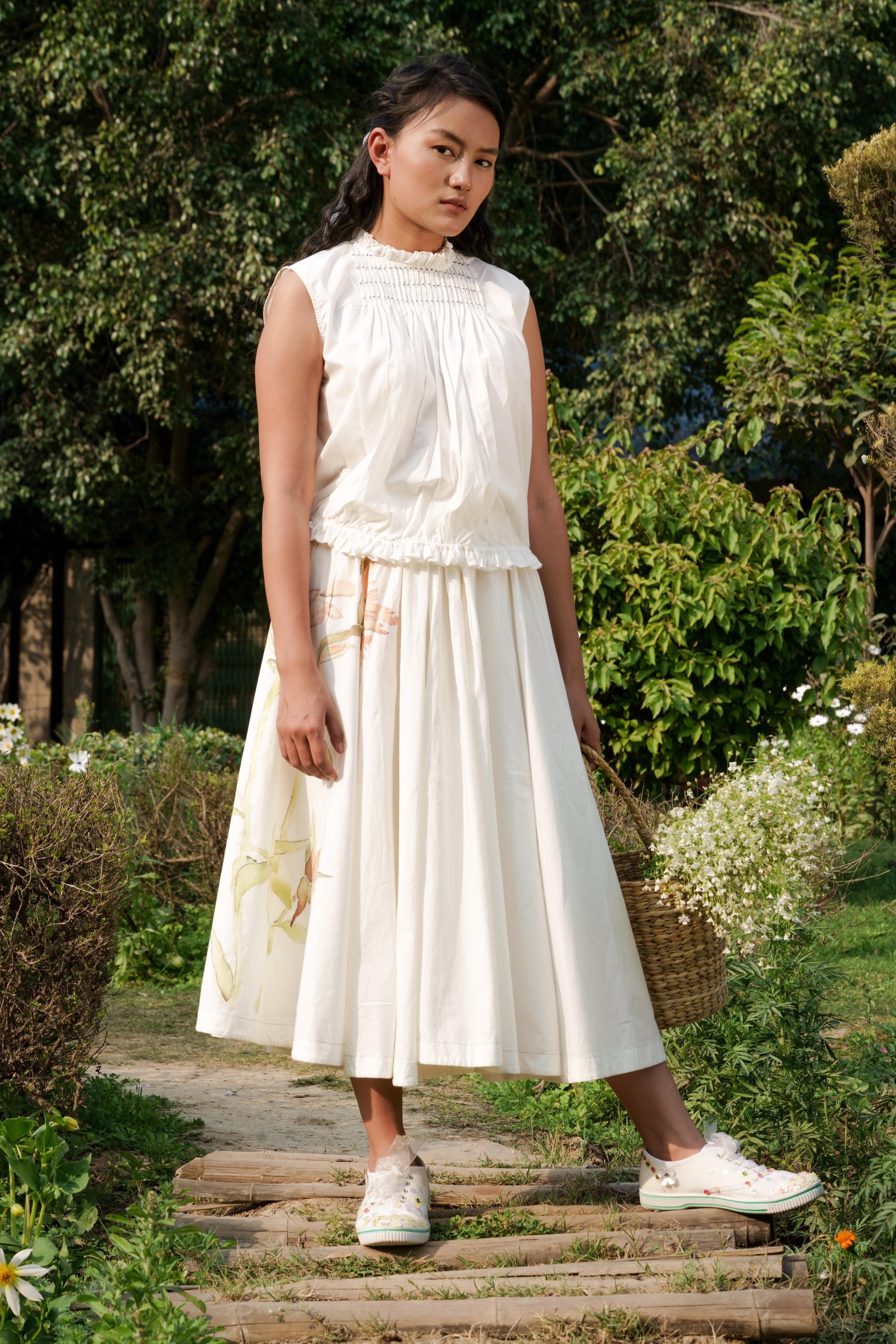 White Tie-up Top by Ahmev with Backless Tops, Casual Wear, Cottage Garden, Cottage Garden by Ahmev, Cotton, Highend fashion, July Sale, July Sale 2023, Natural, Relaxed Fit, Sleeveless Tops, Textured, Tops, White, Womenswear at Kamakhyaa for sustainable fashion