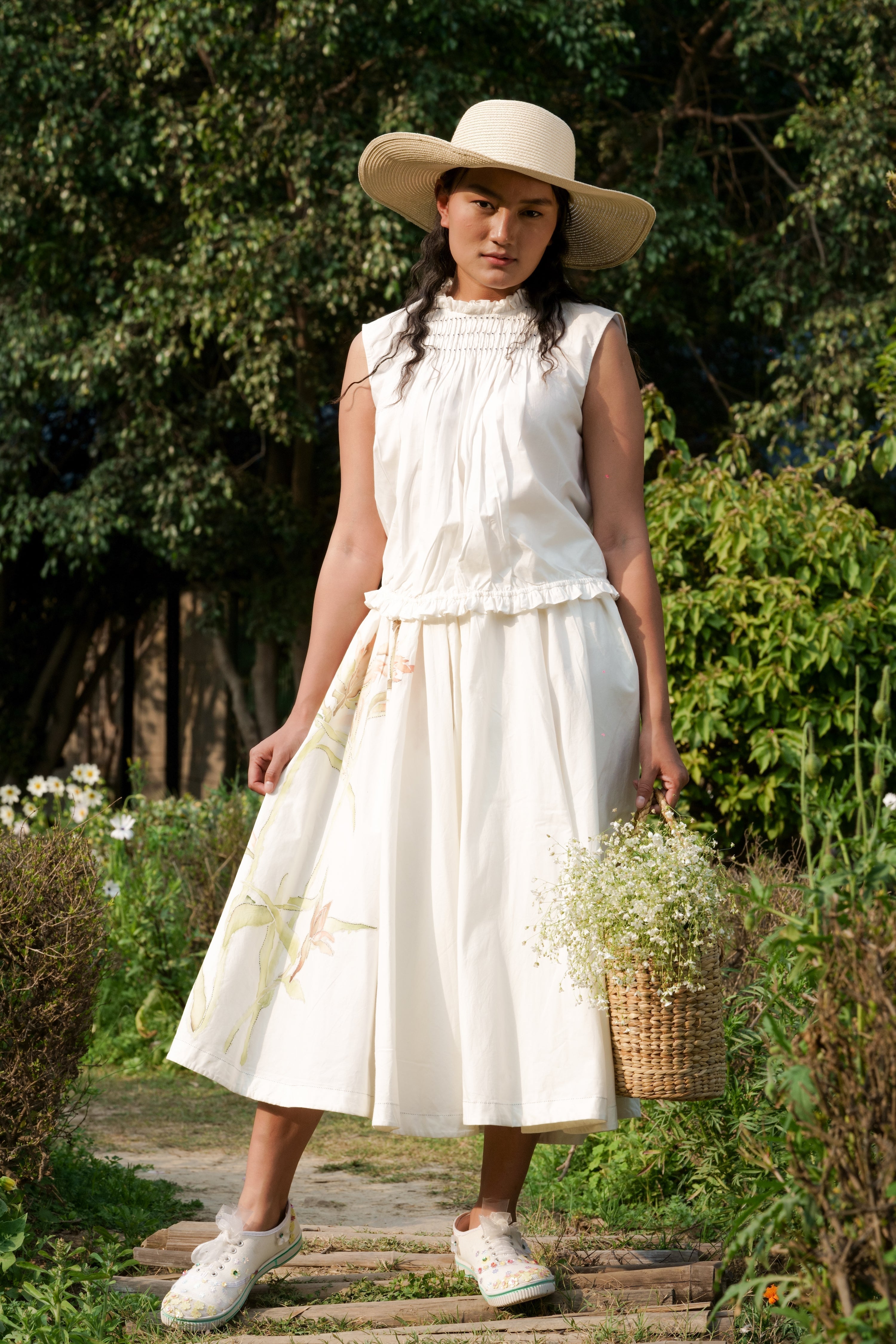 White Tie-up Top by Ahmev with Backless Tops, Casual Wear, Cottage Garden, Cottage Garden by Ahmev, Cotton, Highend fashion, July Sale, July Sale 2023, Natural, Relaxed Fit, Sleeveless Tops, Textured, Tops, White, Womenswear at Kamakhyaa for sustainable fashion