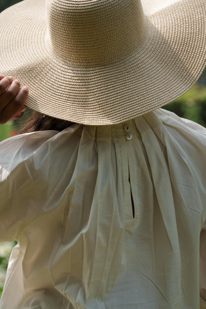 White Cotton Pleated Top by Ahmev with Casual Wear, Cottage Garden, Cottage Garden by Ahmev, Cotton, Crop Tops, July Sale, July Sale 2023, Natural, Relaxed Fit, Solids, Tops, White, Womenswear at Kamakhyaa for sustainable fashion