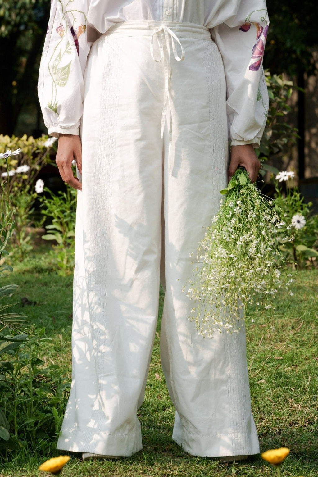 White Cotton Pants by Ahmev with 100% Cotton, Casual wear, Cottage Garden, Cottage Garden by Ahmev, Natural, RE 2.O, Regular, Rias JaipurBottoms, solids, Unisex, White, Womenswear at Kamakhyaa for sustainable fashion