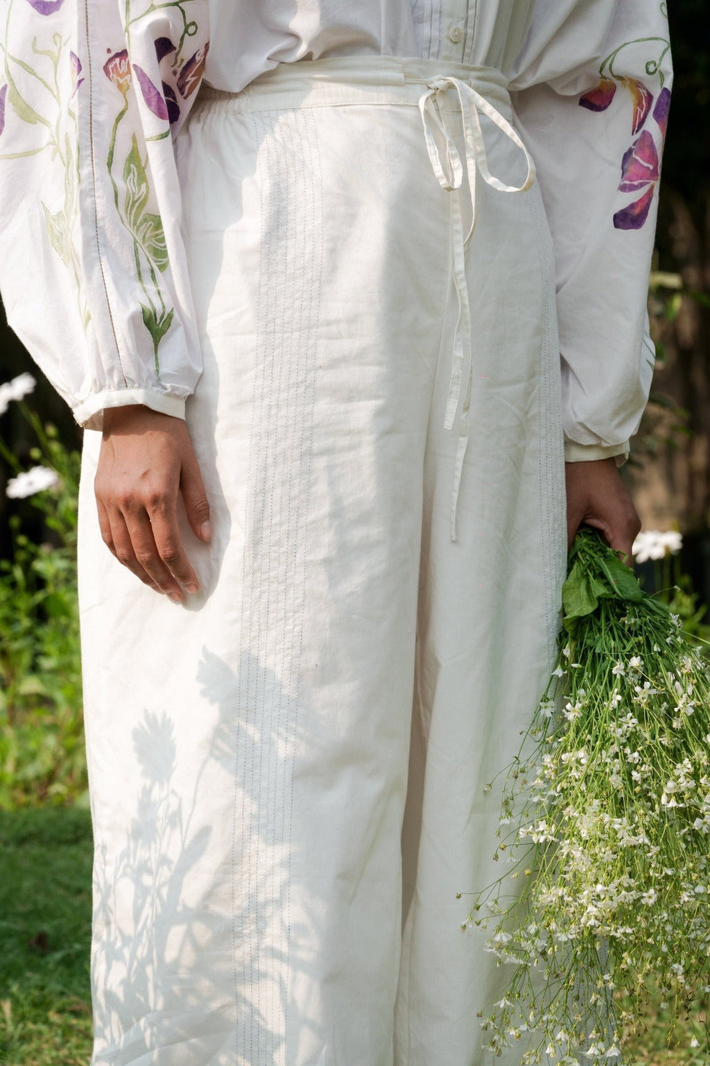 White Cotton Pants by Ahmev with 100% Cotton, Casual wear, Cottage Garden, Cottage Garden by Ahmev, Natural, RE 2.O, Regular, Rias JaipurBottoms, solids, Unisex, White, Womenswear at Kamakhyaa for sustainable fashion