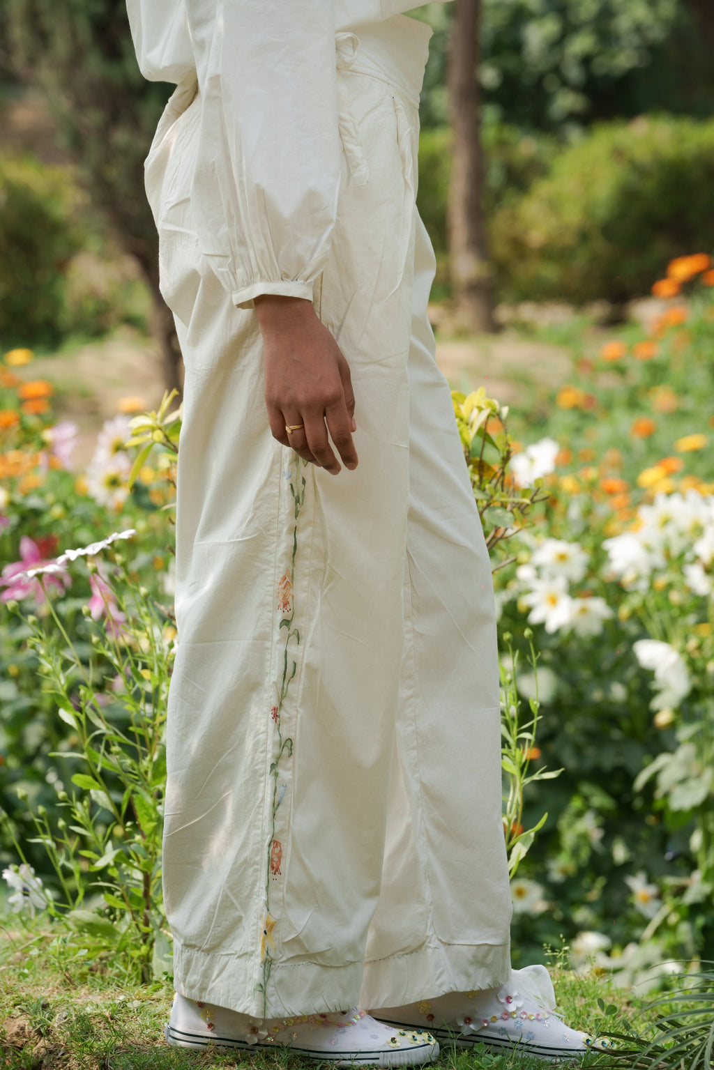 White Hand Painted Pants by Ahmev with Batik, Casual Wear, Cottage Garden, Cottage Garden by Ahmev, Cotton, Fitted At Waist, Handpainted, July Sale, July Sale 2023, Natural, Pants, Solids, White, Womenswear at Kamakhyaa for sustainable fashion