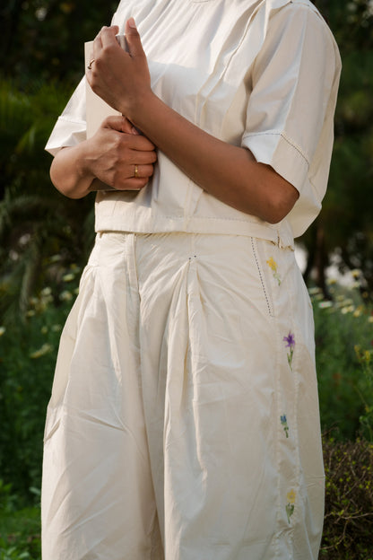 White Cotton Boyfriend Pants by Ahmev with Batik, Casual Wear, Cottage Garden, Cottage Garden by Ahmev, Cotton, Fitted At Waist, Handpainted, July Sale, July Sale 2023, Natural, Palazzo Pants, Solids, White, Womenswear at Kamakhyaa for sustainable fashion