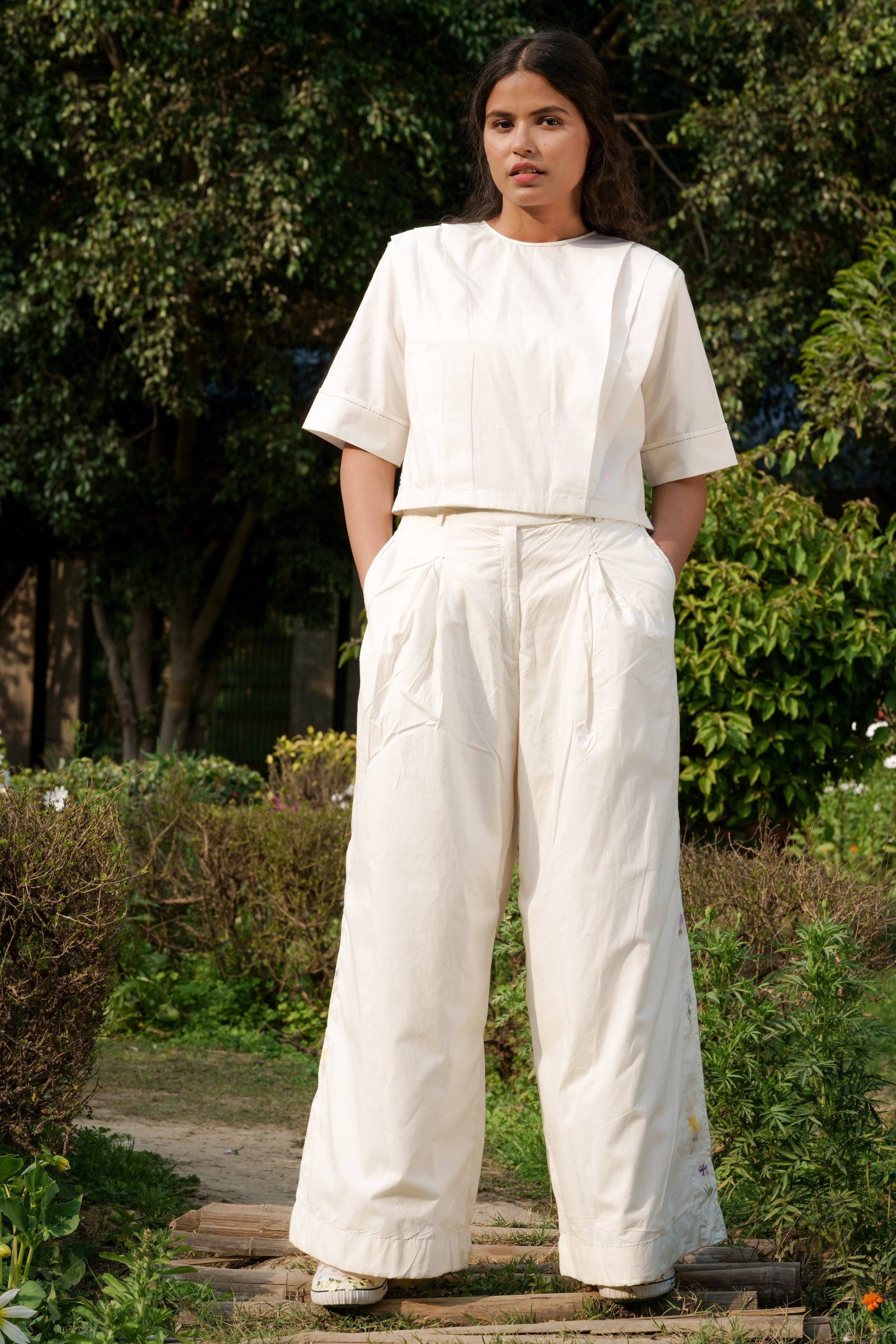 White Cotton Boyfriend Pants by Ahmev with Batik, Casual Wear, Cottage Garden, Cottage Garden by Ahmev, Cotton, Fitted At Waist, Handpainted, July Sale, July Sale 2023, Natural, Palazzo Pants, Solids, White, Womenswear at Kamakhyaa for sustainable fashion