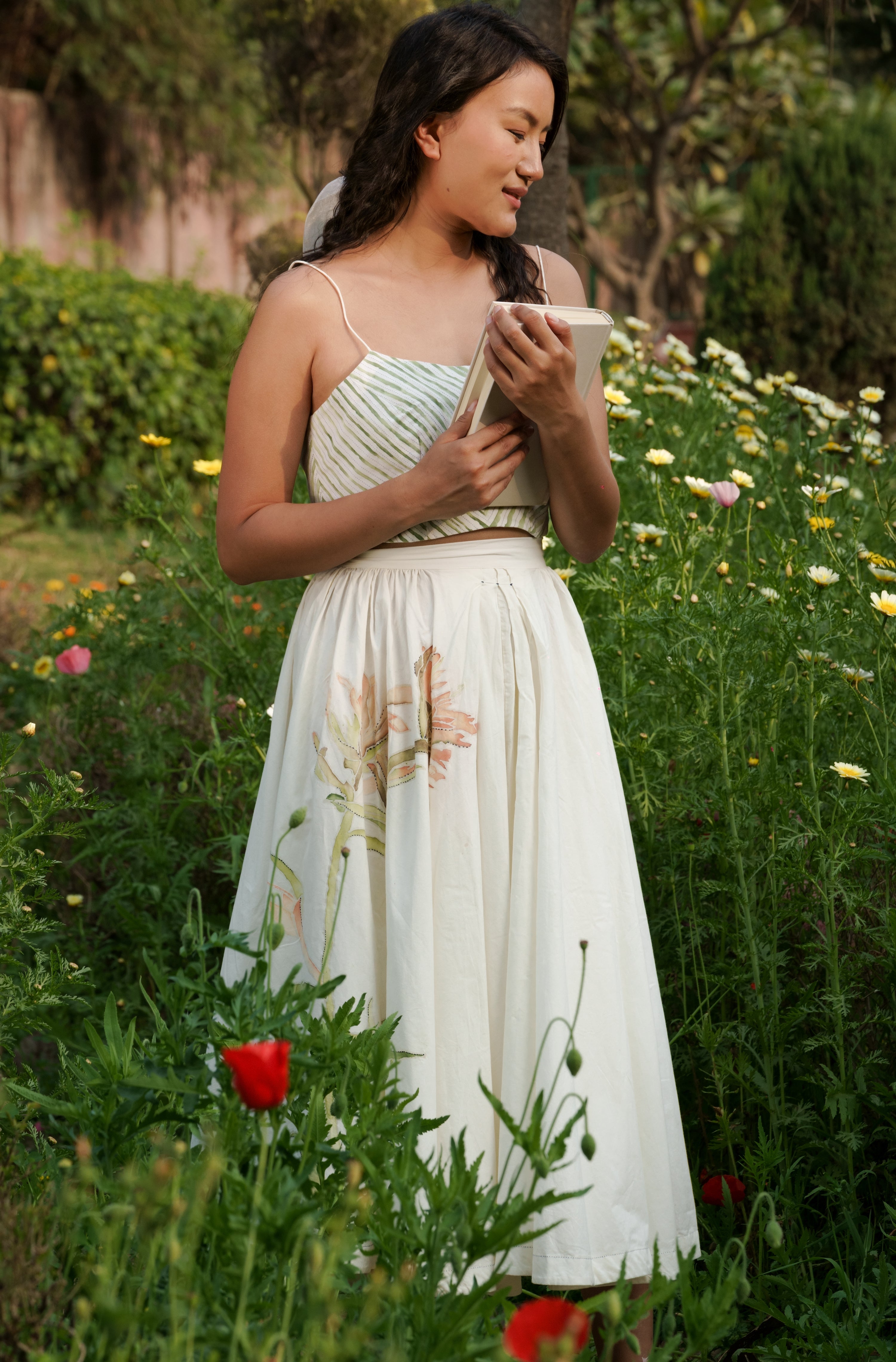 White Cotton circular skirt by Ahmev with Batik, Casual Wear, Cottage Garden, Cottage Garden by Ahmev, Cotton, Fitted At Waist, Hanpainted, July Sale, July Sale 2023, Midi Skirts, Natural, Prints, Skirts, White, Womenswear at Kamakhyaa for sustainable fashion