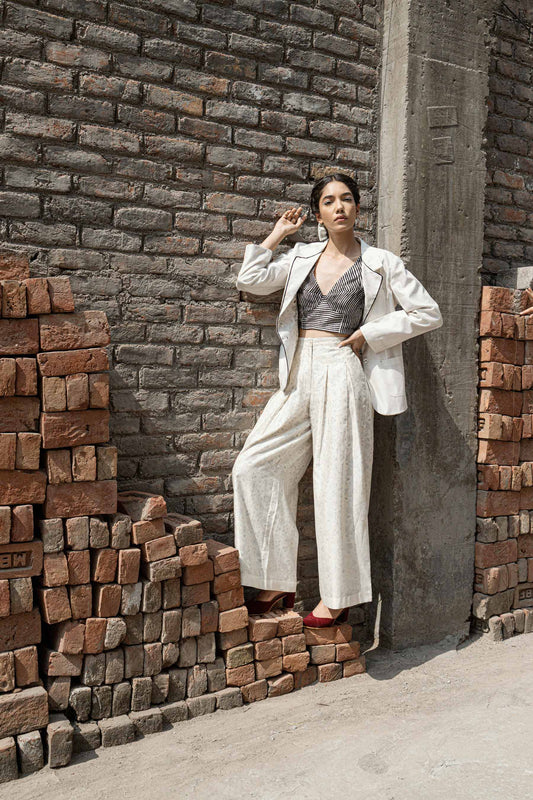 Ivory Chanderi Pleated Pants by Ahmev with Best Selling, Casual Wear, Chanderi, Ink And Ivory, Ink And Ivory by Ahmev, Natural, Palazzo Pants, Prints, Relaxed Fit, White, Womenswear at Kamakhyaa for sustainable fashion