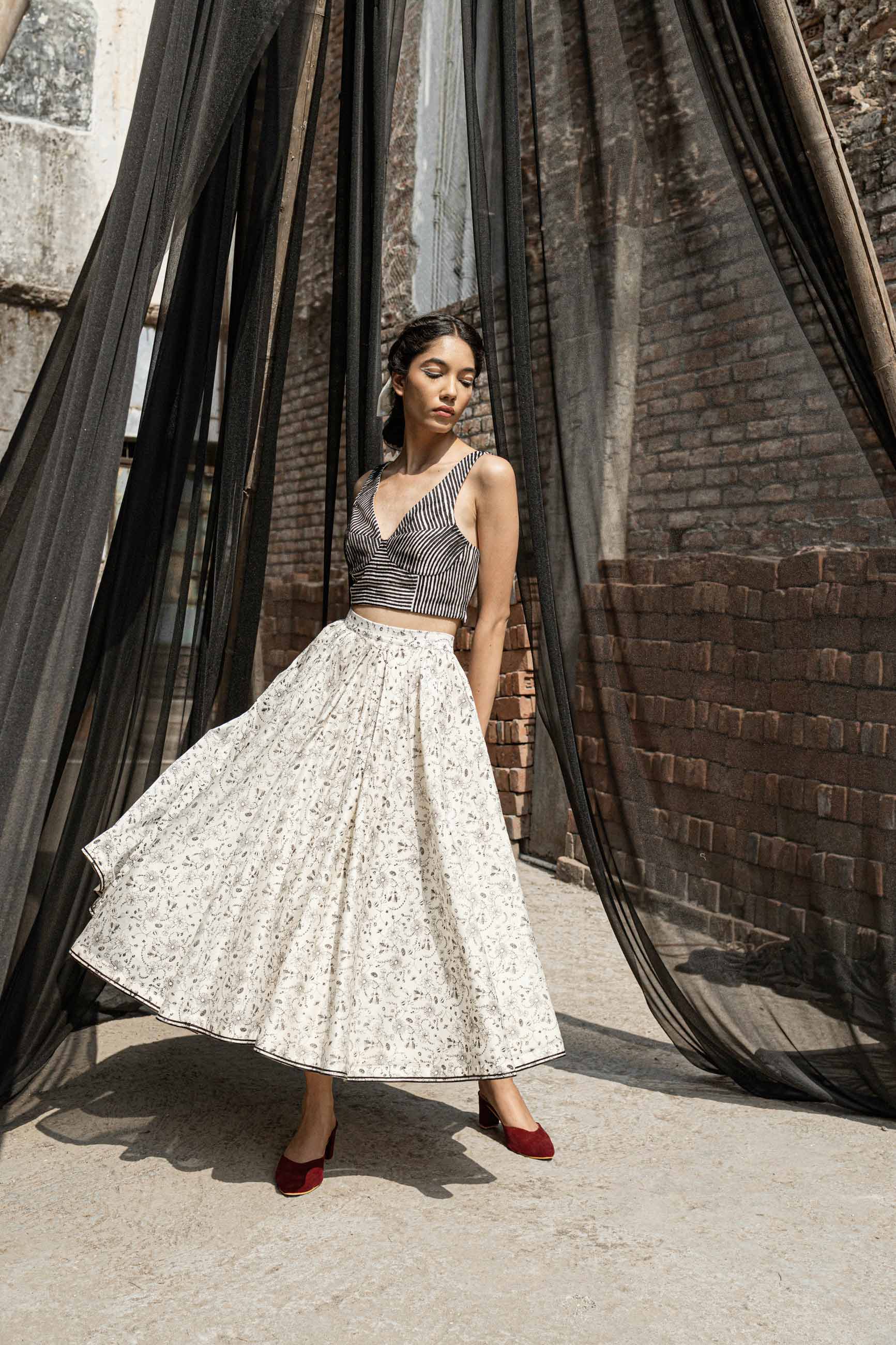 Ivory Chanderi Skirt by Ahmev with Best Selling, Casual Wear, Chanderi, Ink And Ivory, Ink And Ivory by Ahmev, Midi Skirts, Natural, Prints, Relaxed Fit, Skirts, White, Womenswear at Kamakhyaa for sustainable fashion