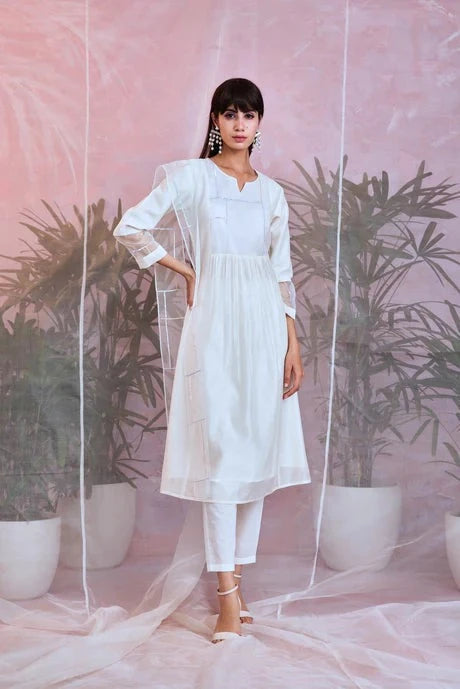 White Cotton Chanderi Kurta Set With Organza Dupatta by Charkhee with Aasma by Charkhee, Aasmaa by Charkhee, Chanderi, Cotton, Embellished, Indian Wear, Kurta Pant Sets, Kurta Set With Dupatta, Natural, Organza, Relaxed Fit, Sequin work, Wedding Wear, White, Womenswear at Kamakhyaa for sustainable fashion