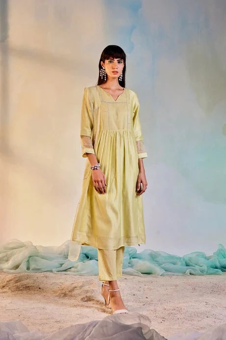 Yellow Cotton Kurta Set With Dupatta by Charkhee with Aasma by Charkhee, Aasmaa by Charkhee, Chanderi, Cotton, Embellished, Indian Wear, Kurta Pant Sets, Kurta Set With Dupatta, Natural, Relaxed Fit, Sequin work, Wedding Wear, Womenswear, Yellow at Kamakhyaa for sustainable fashion